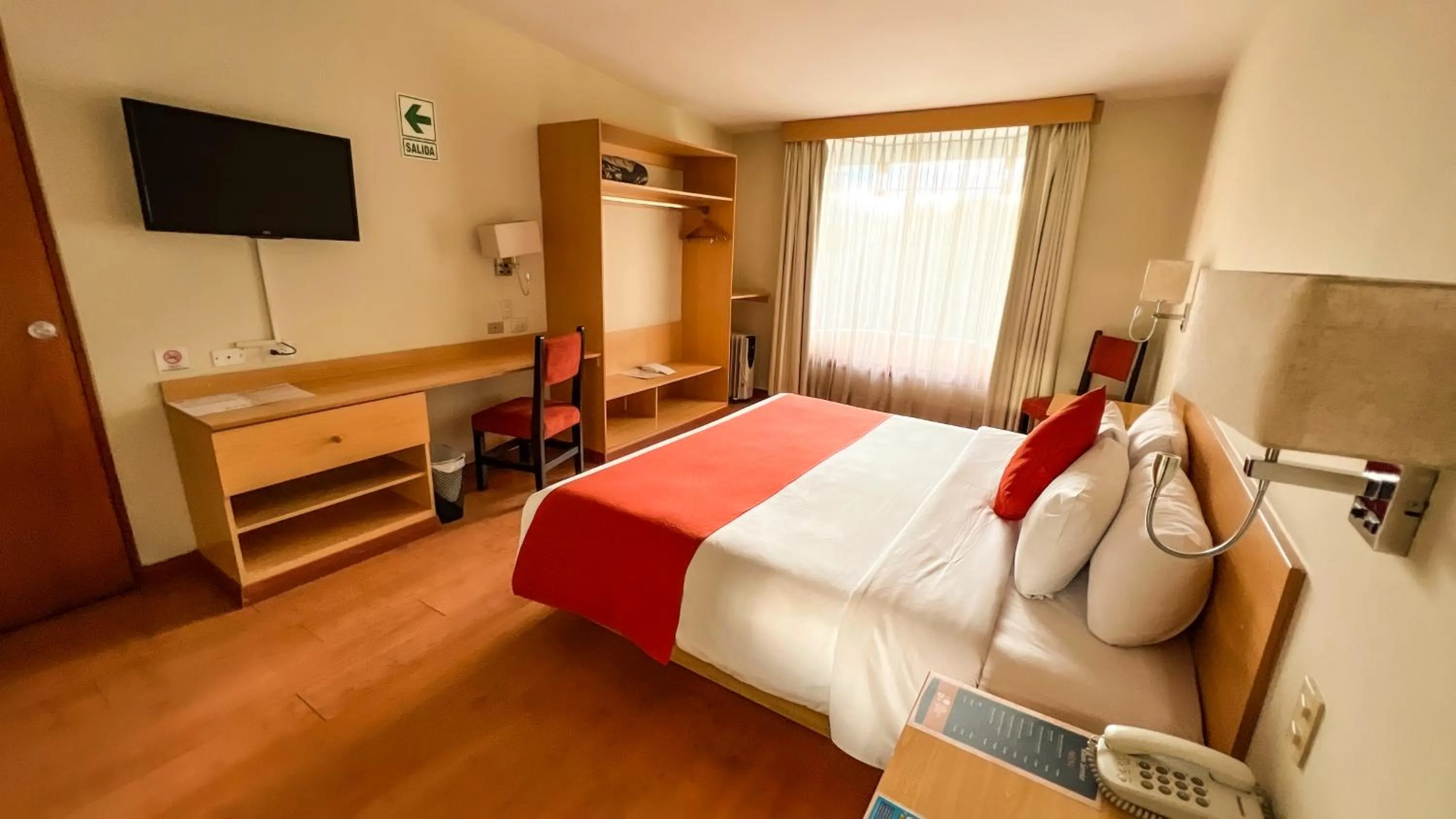 Photo of the whole room, Bed in Lake Titicaca Hotel