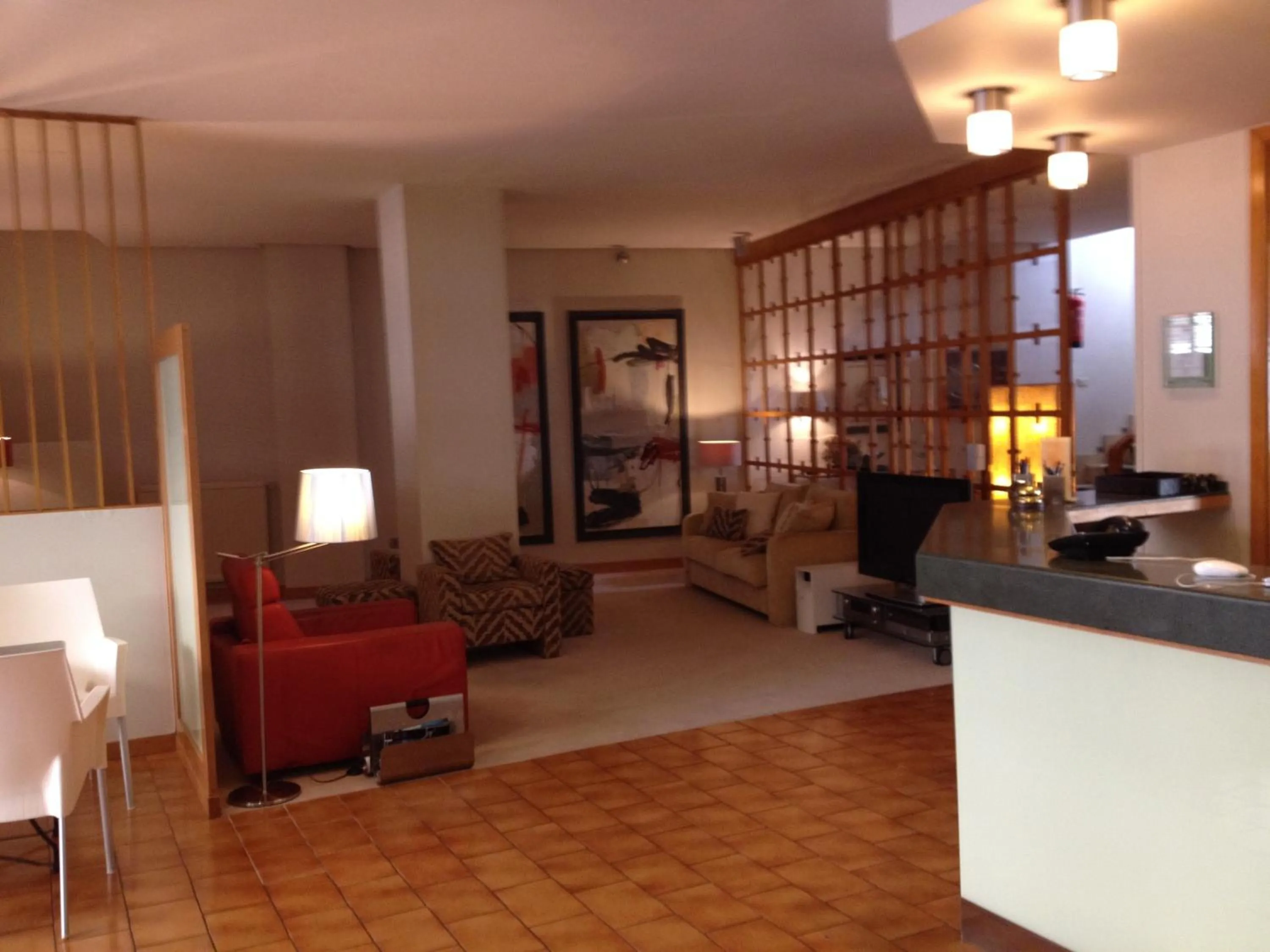 Communal lounge/ TV room, Seating Area in Hotel Jopi