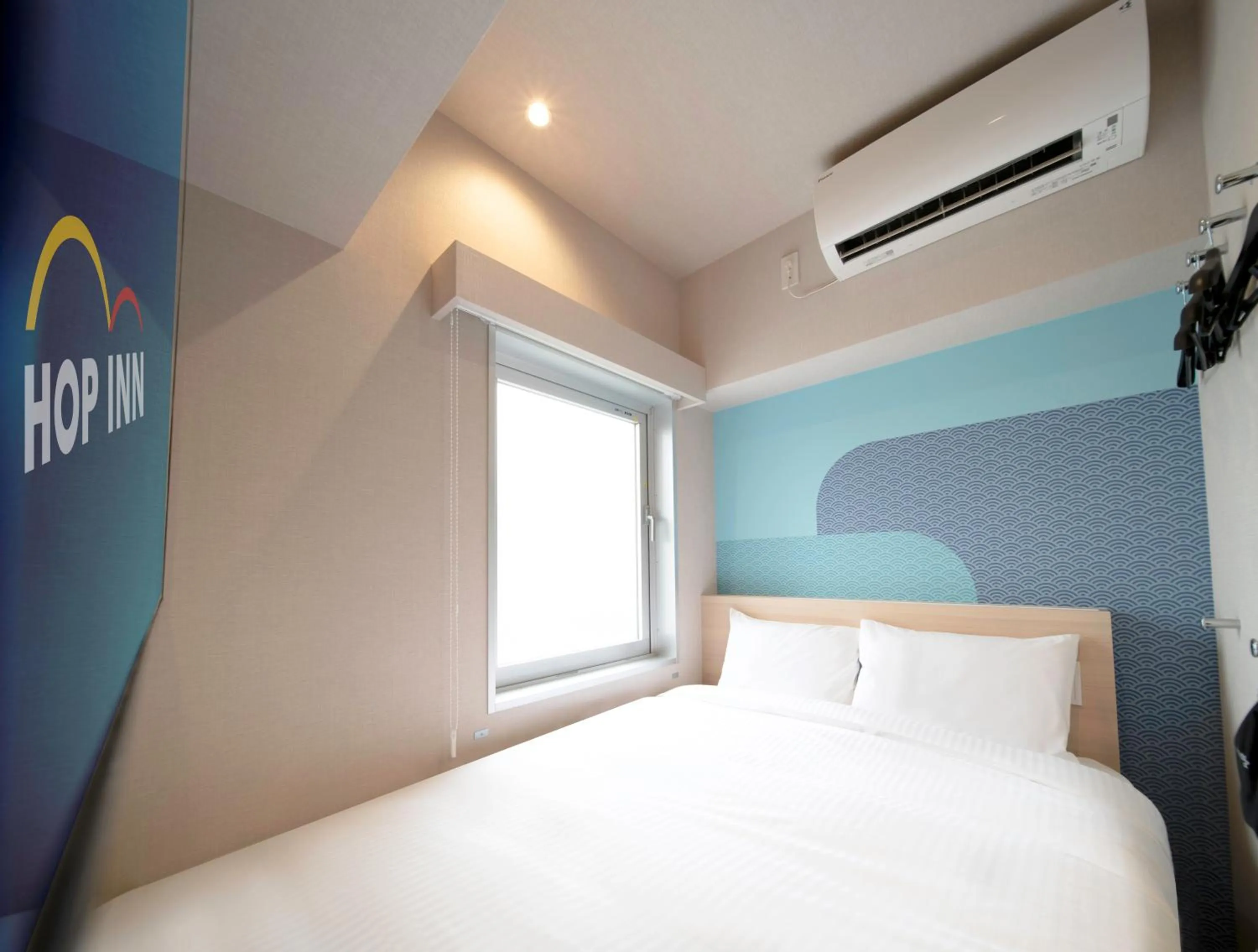 Bed in Hop Inn Tokyo Ueno