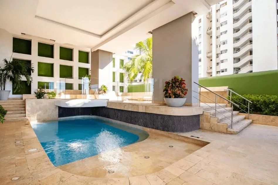 Swimming pool in U-GO Edificio Murano Elite Bocagrande Frente al Mar