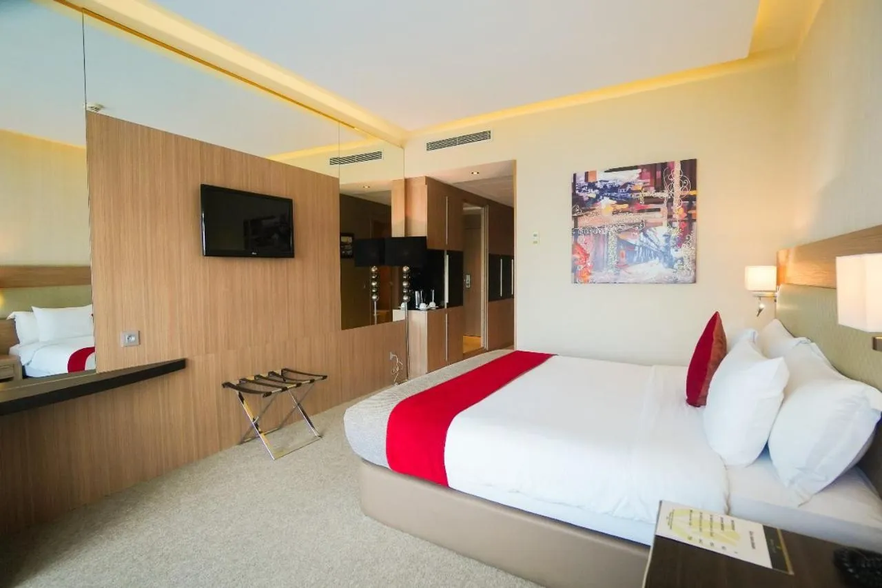 Bed in Royal Tulip City Center