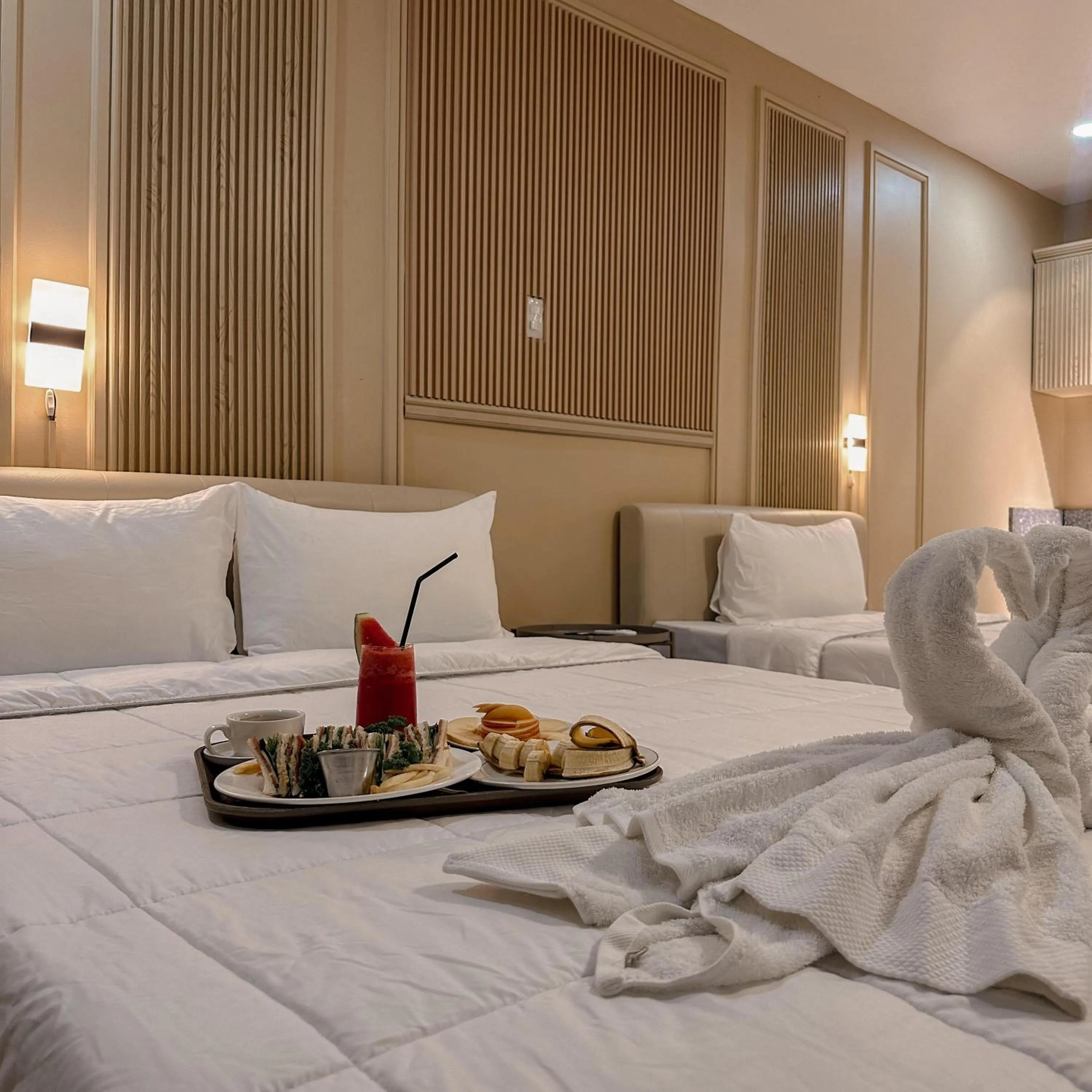 Bed in Clark CU Hotel