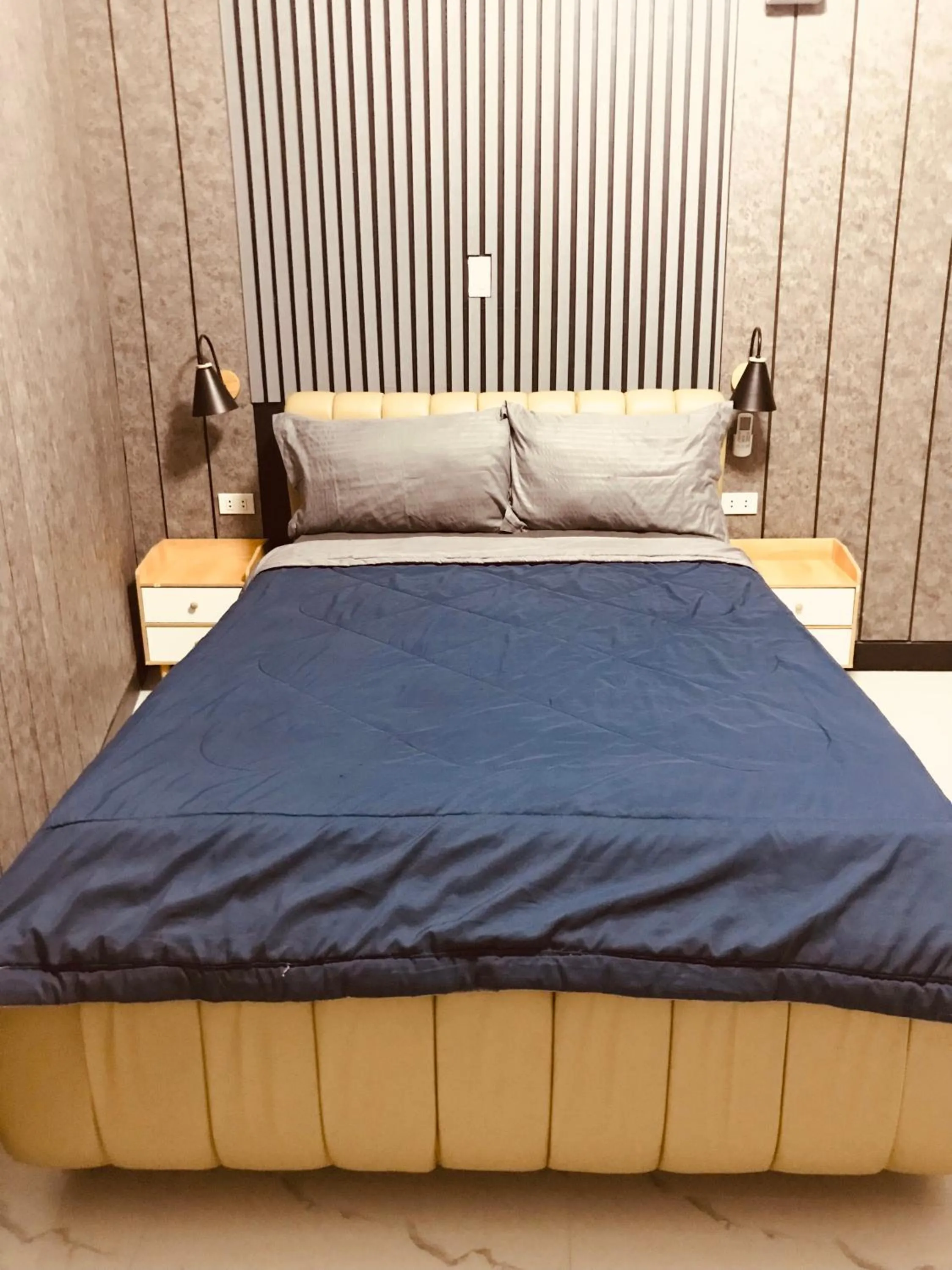 Bed in Clark CU Hotel