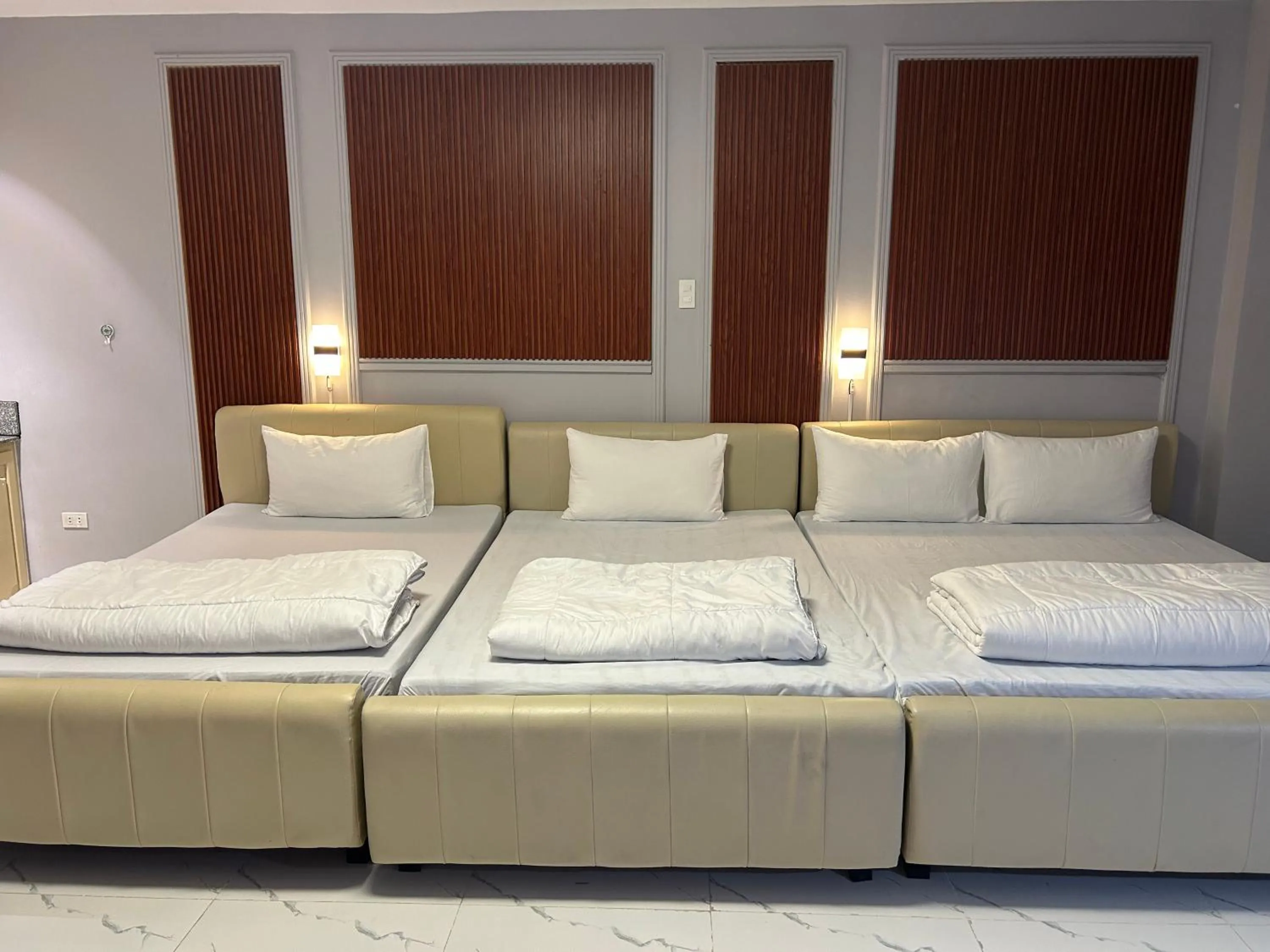 Bed in Clark CU Hotel