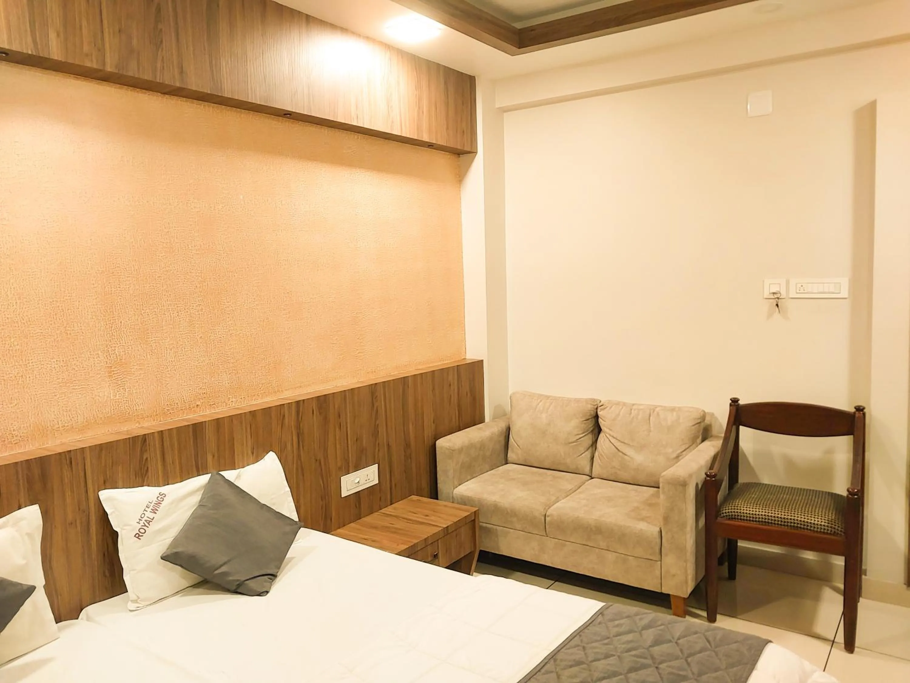 Bed in Hotel Royal Wings