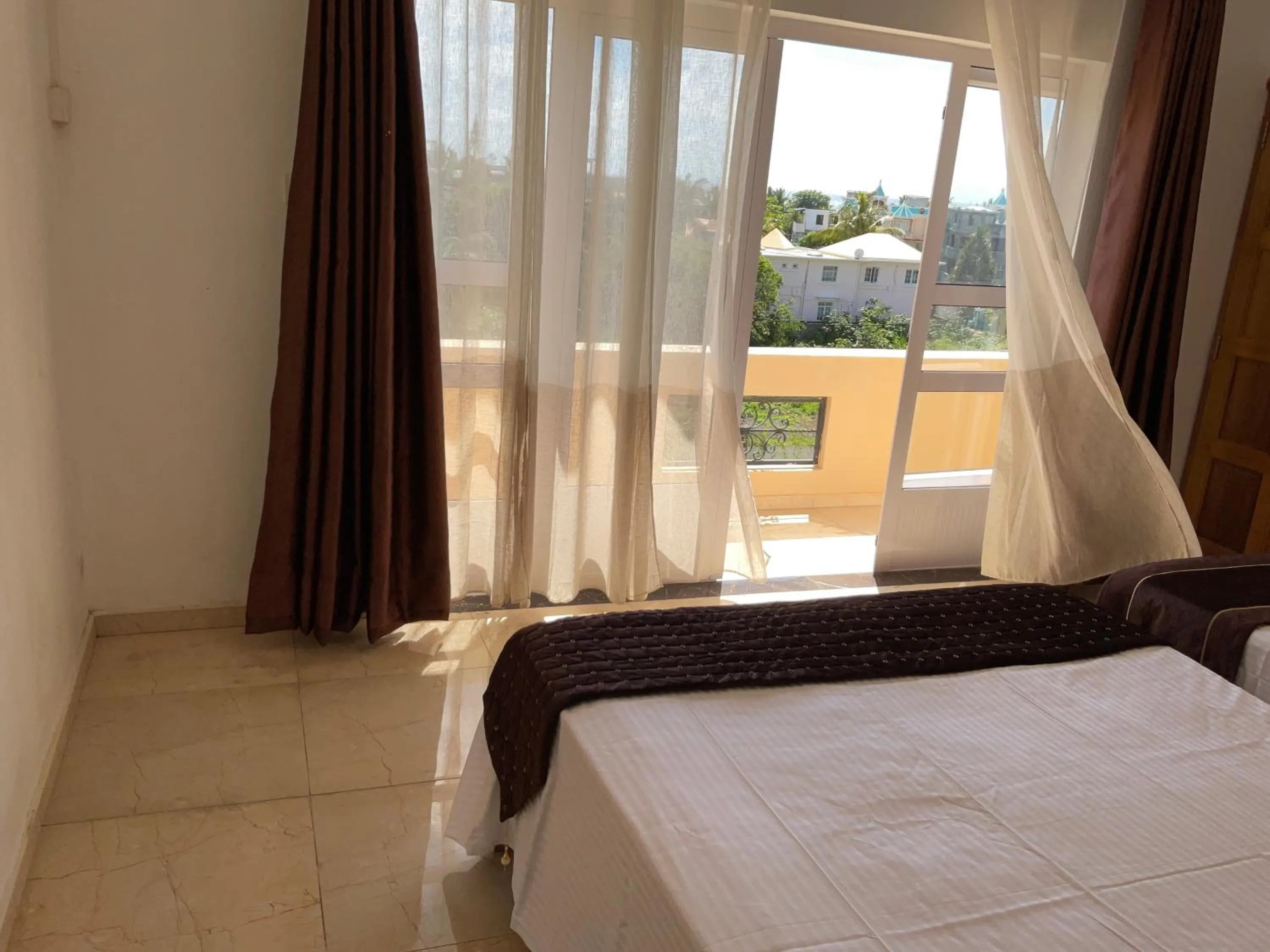 Bed in Blue Bay Holiday Resort