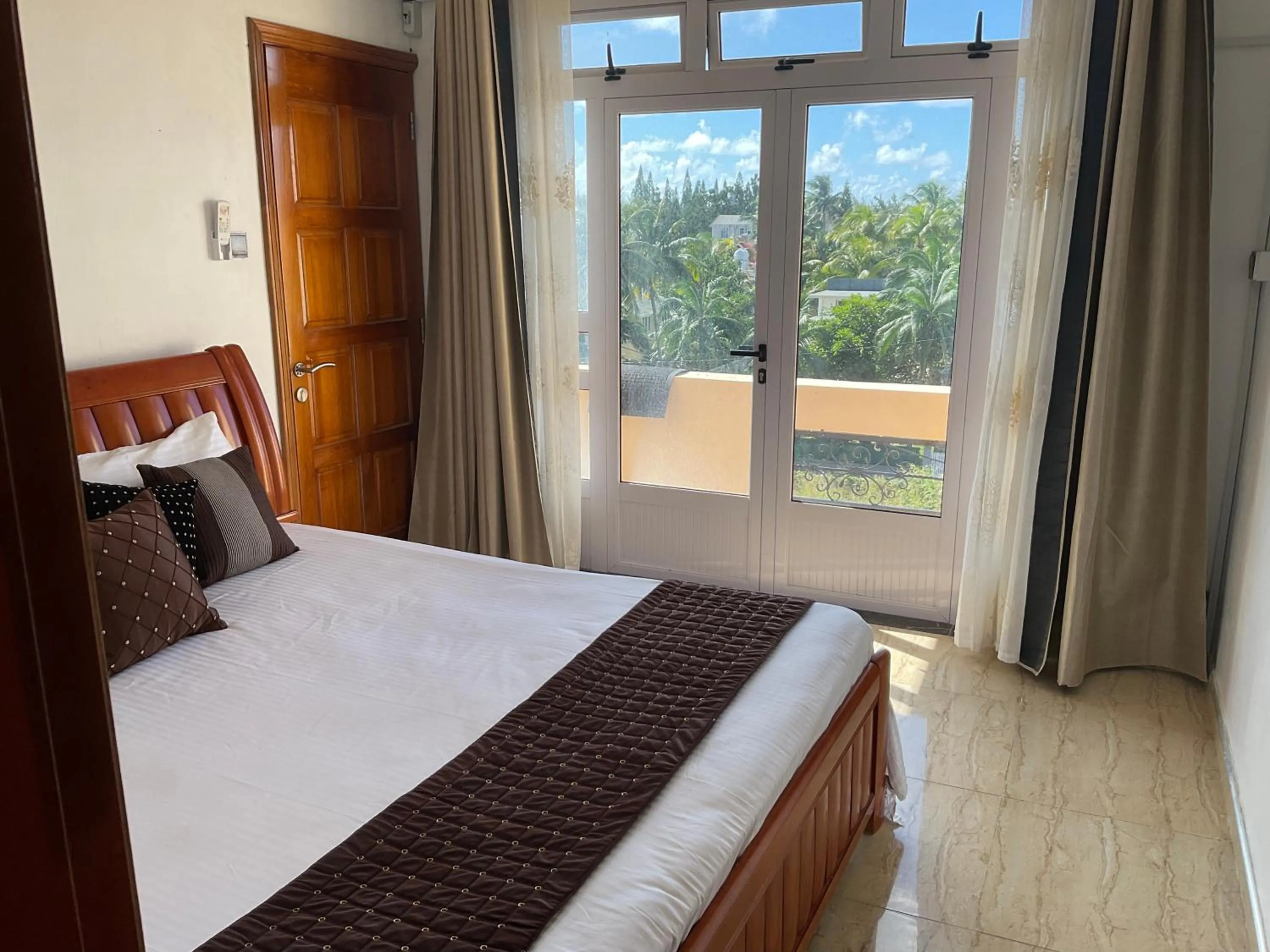 Bed in Blue Bay Holiday Resort