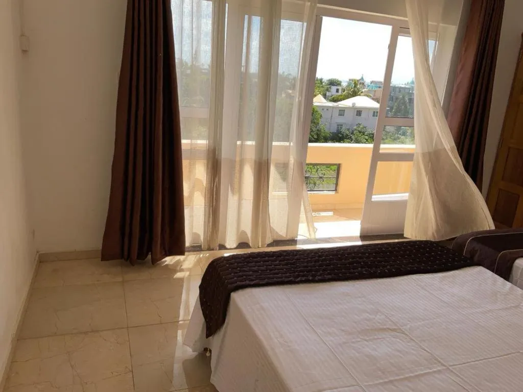 View (from property/room), Bed in Blue Bay Holiday Resort