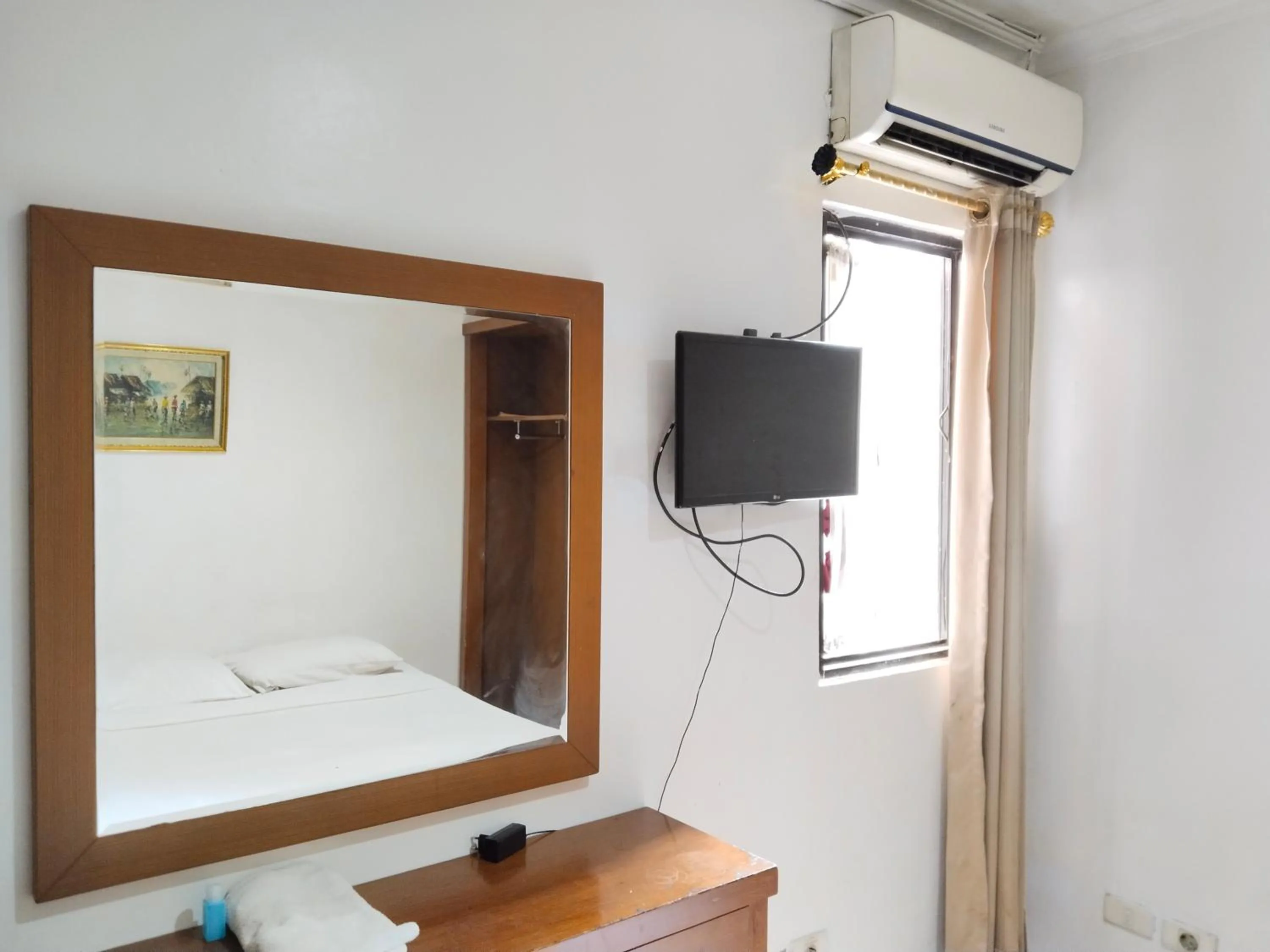 Bed in Metro Hotel Bekasi powered by Cocotel