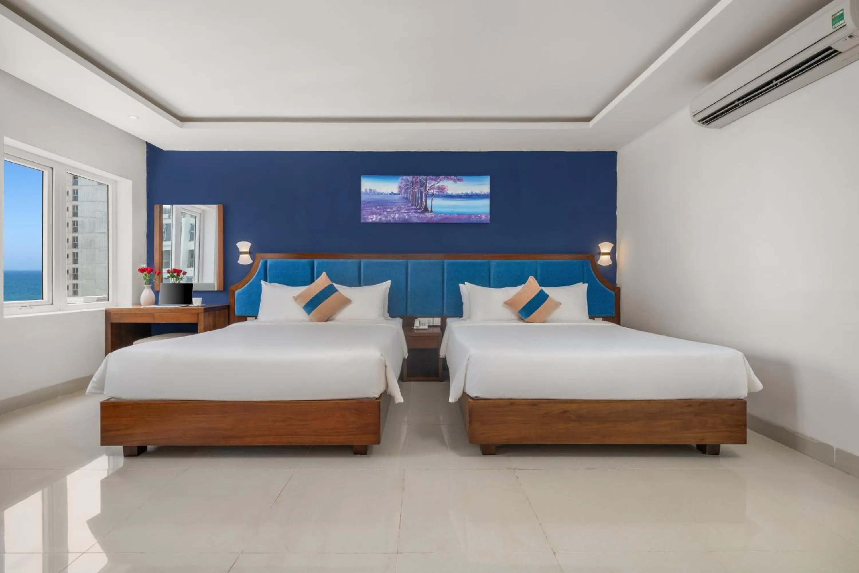 Bed in TGT BEACH HOTEL