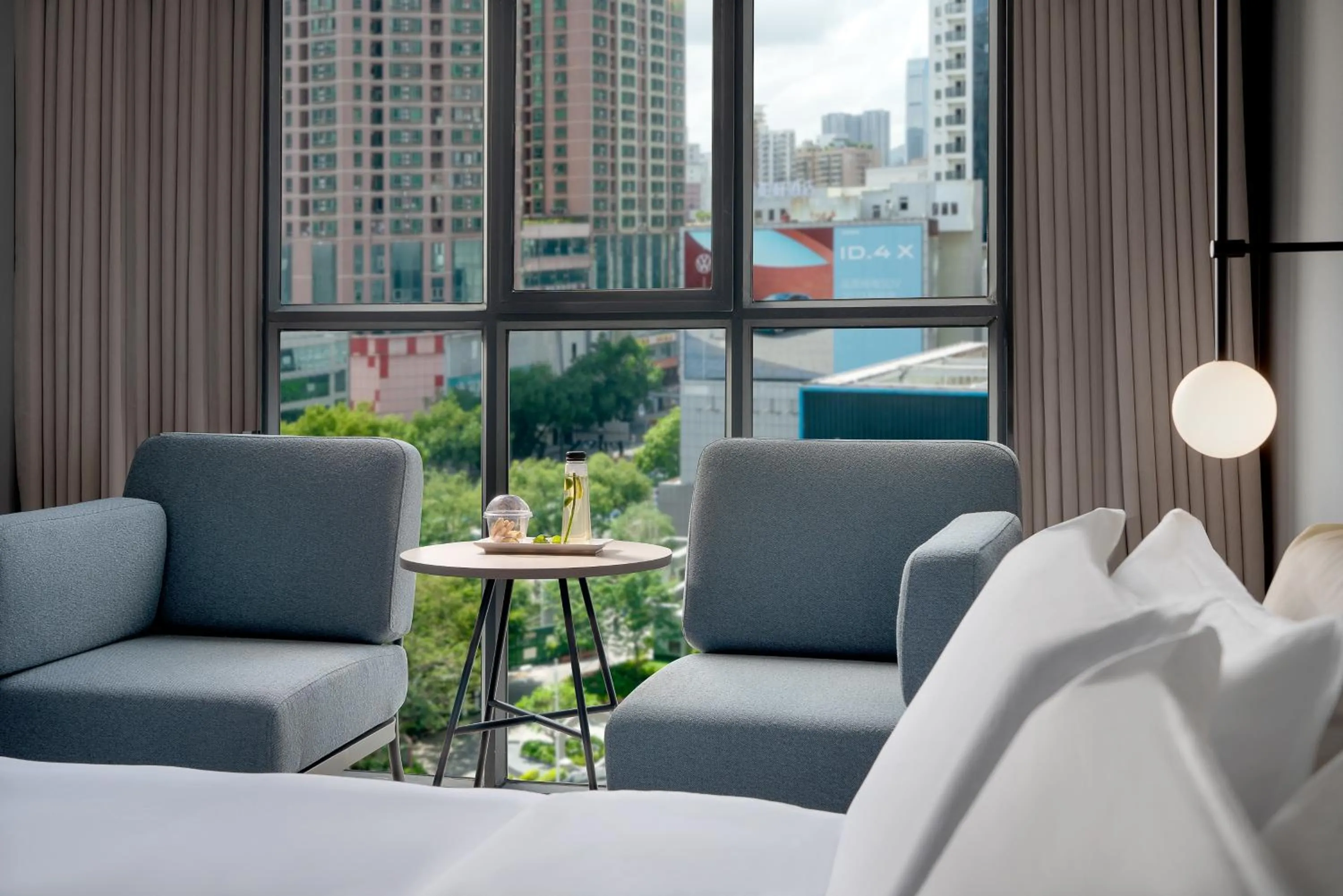 Seating area in CYBO Station SSAW Shangpin Hotel Luohu Shenzhen