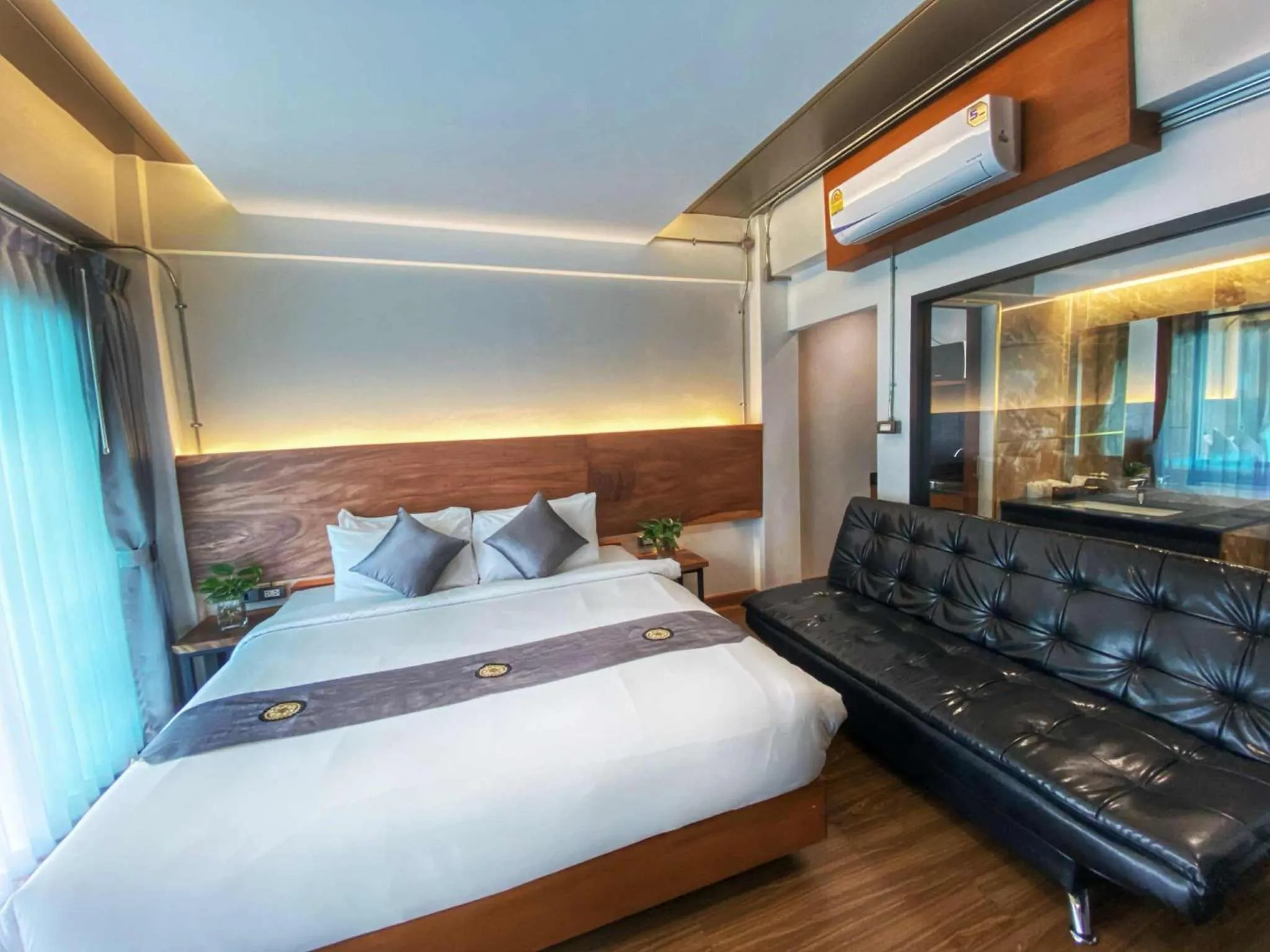 Bed in Lanna Tree Boutique Hotel