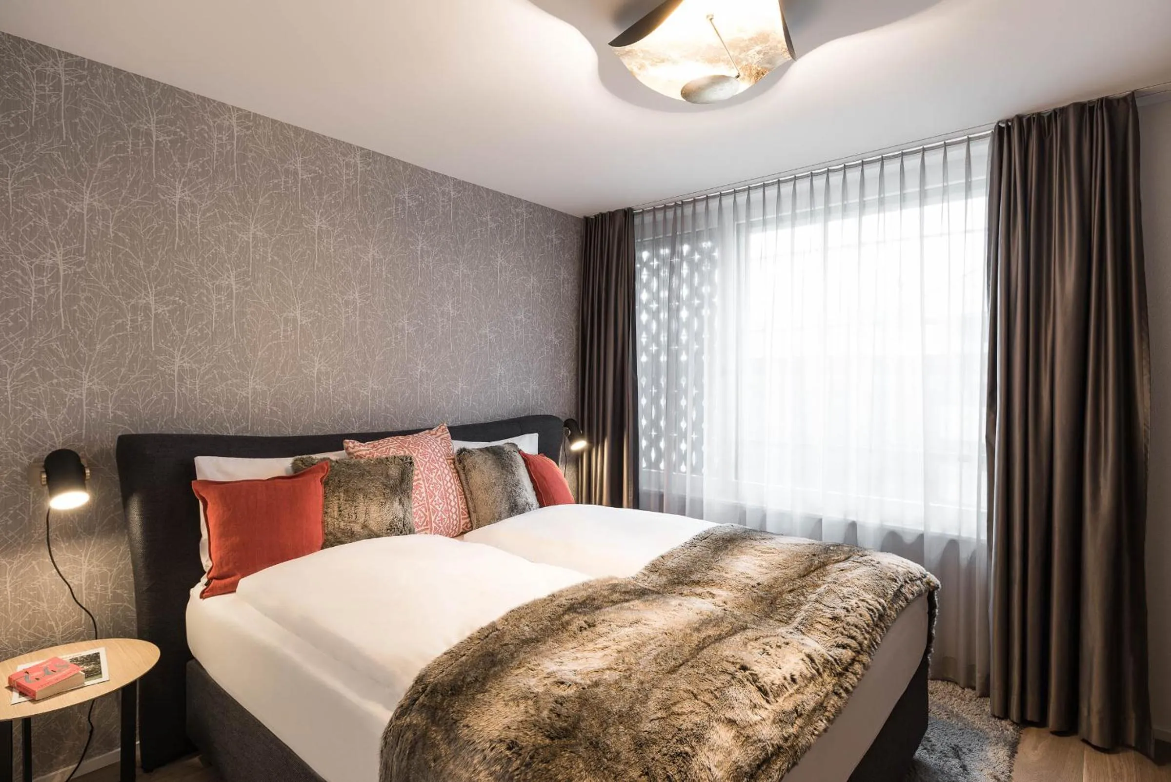 Photo of the whole room, Bed in Andermatt Alpine Apartments