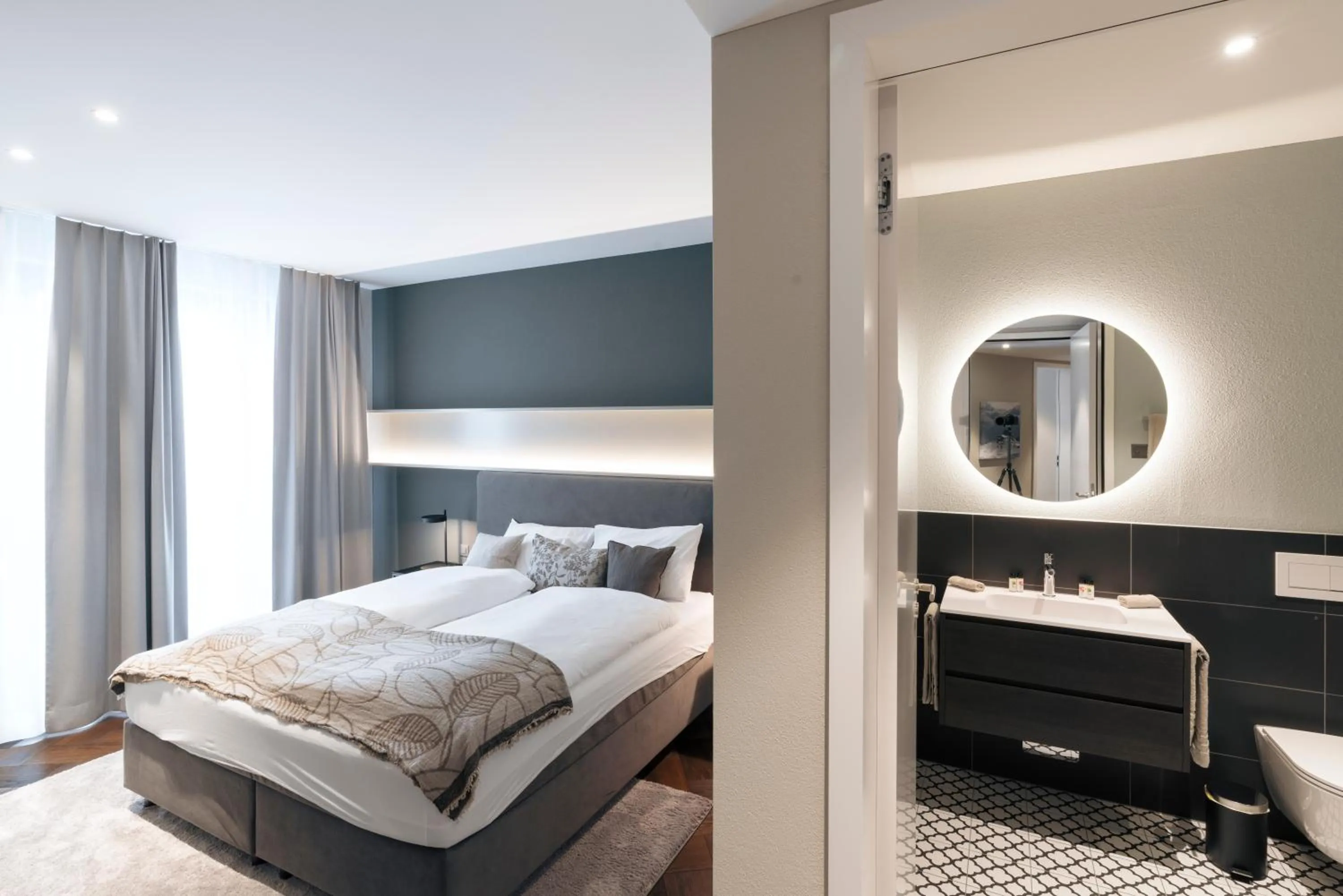 Photo of the whole room, Bed in Andermatt Alpine Apartments