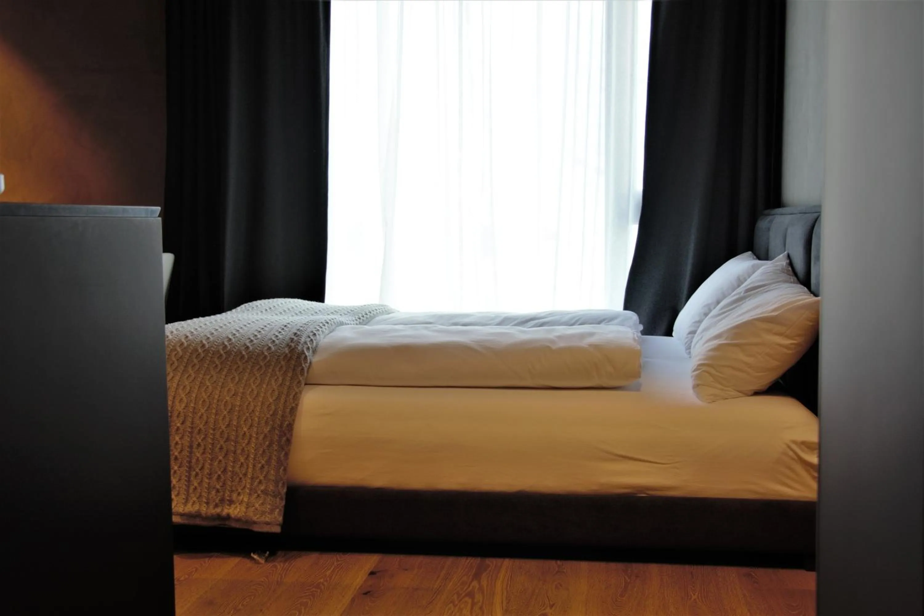 Bedroom, Bed in Andermatt Alpine Apartments