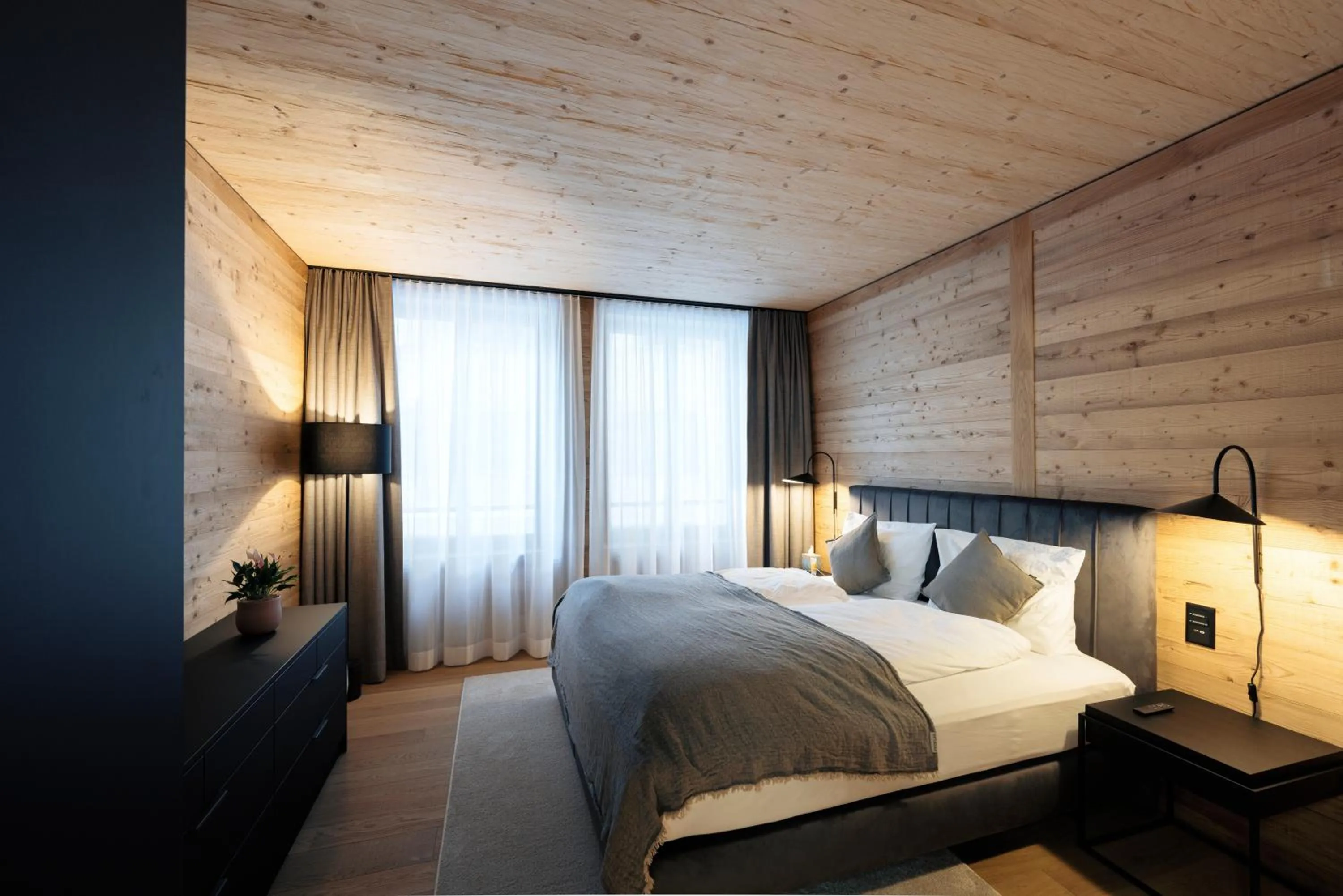 Bedroom, Bed in Andermatt Alpine Apartments