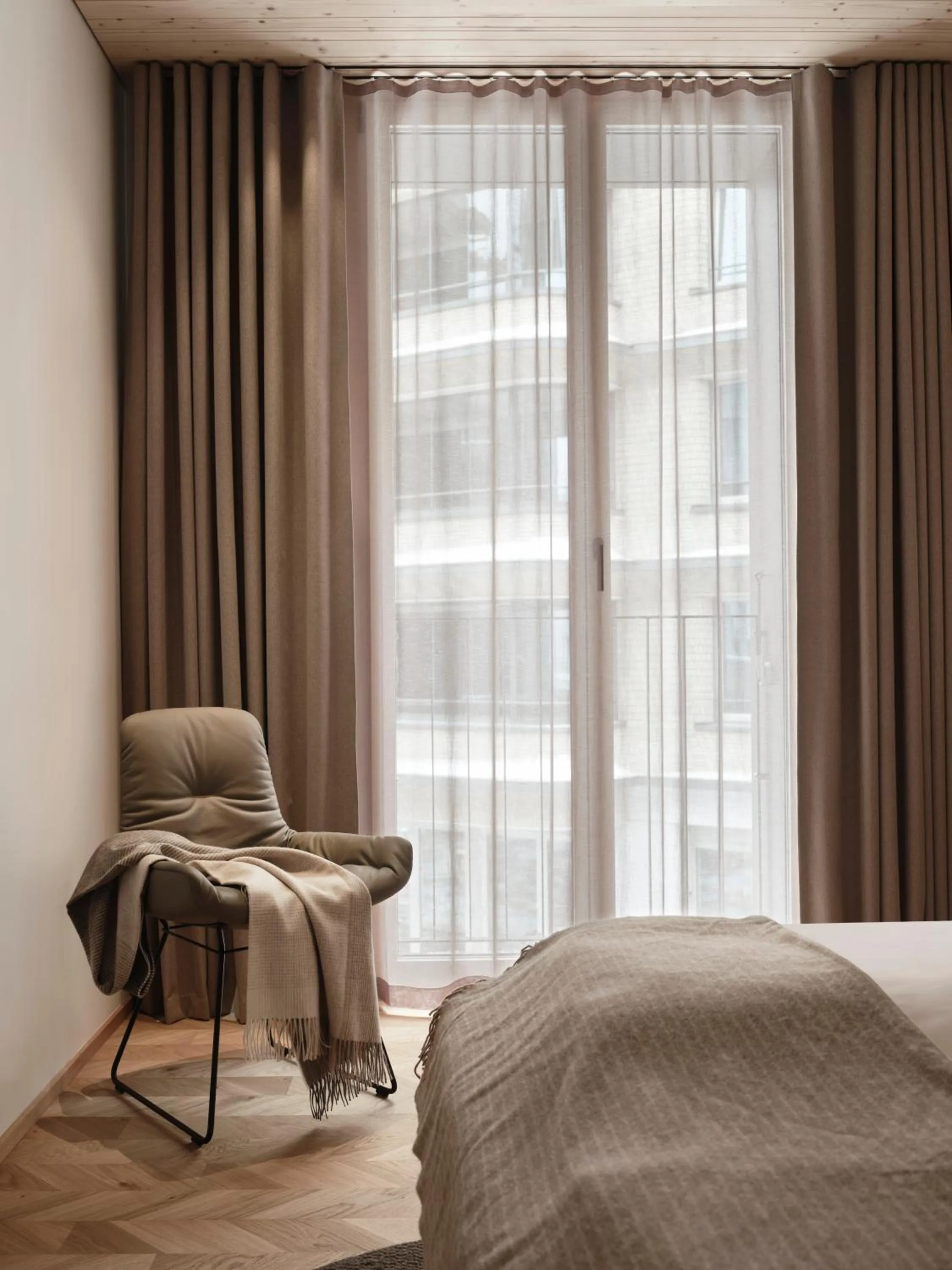 Bed in Andermatt Alpine Apartments