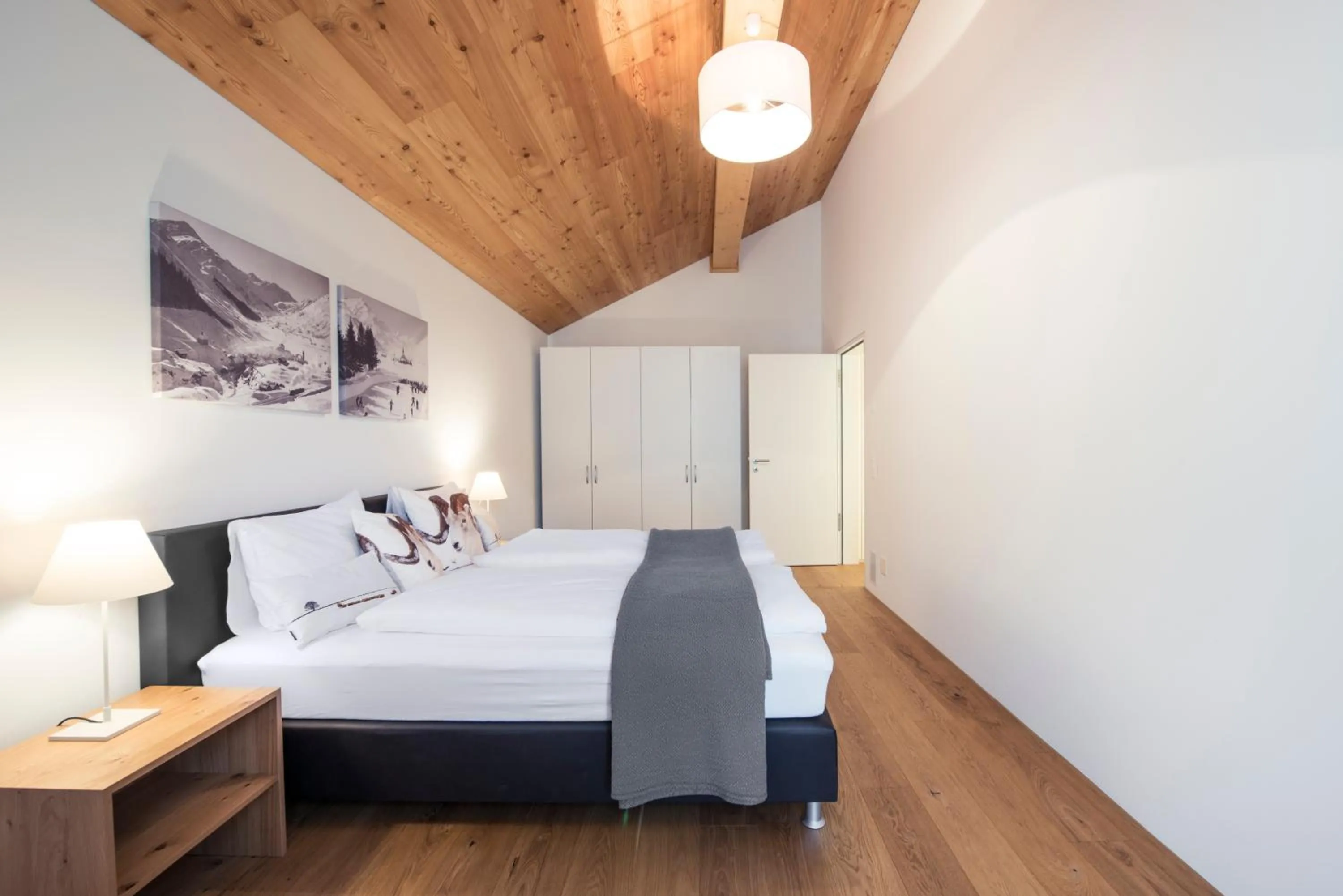 Bedroom, Bed in Andermatt Alpine Apartments