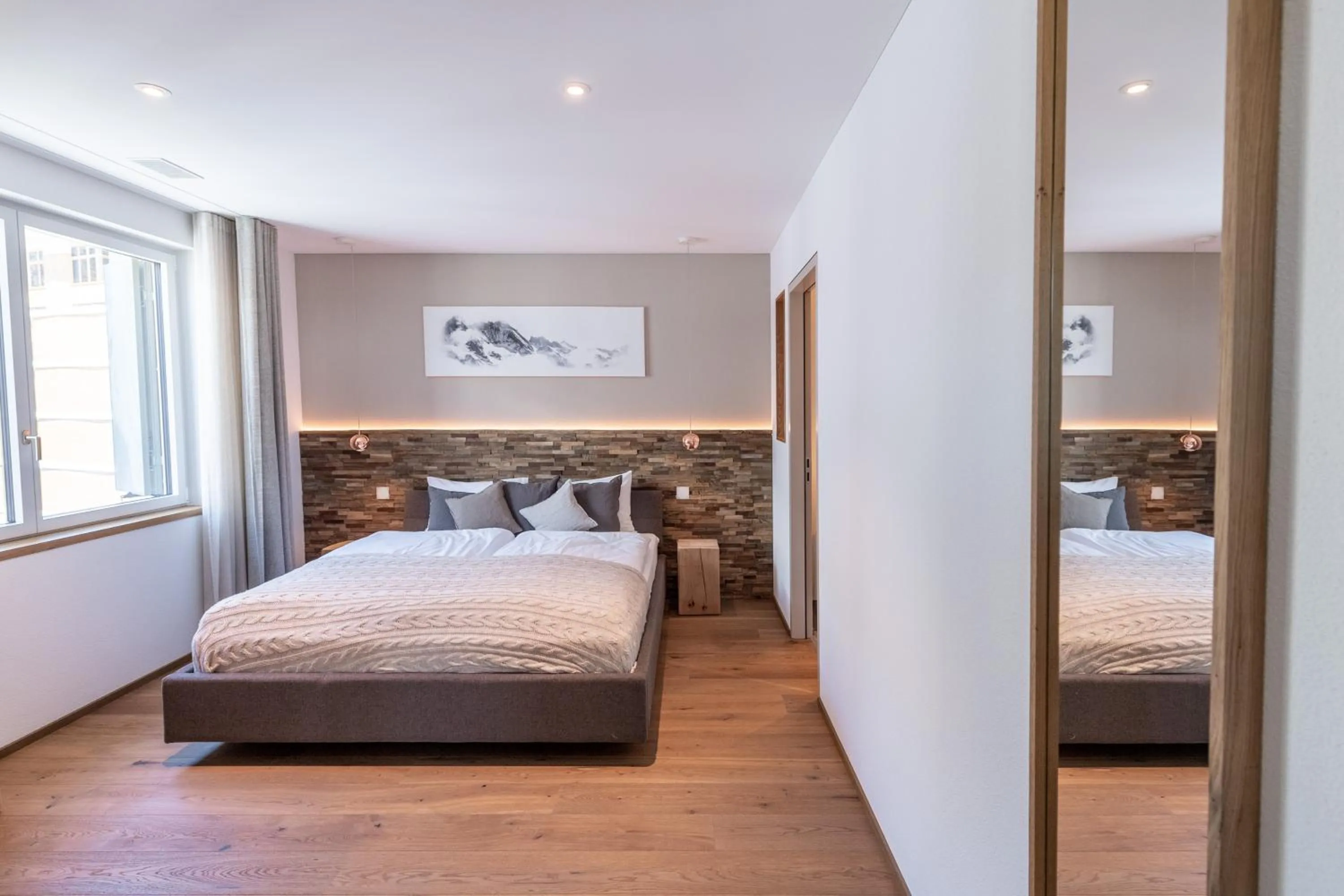 Bedroom, Bed in Andermatt Alpine Apartments