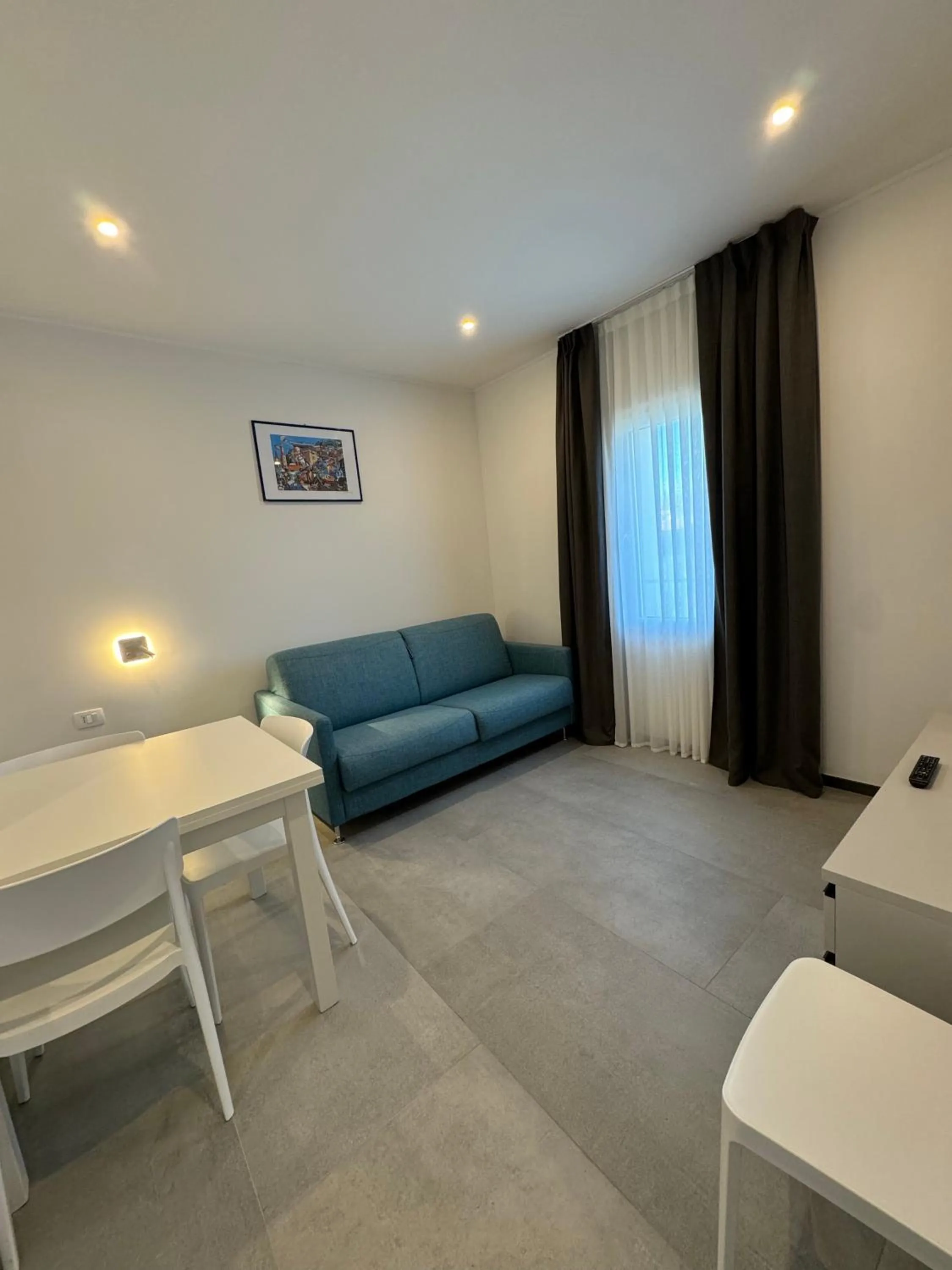 Living room, Bed in Residence Cervia