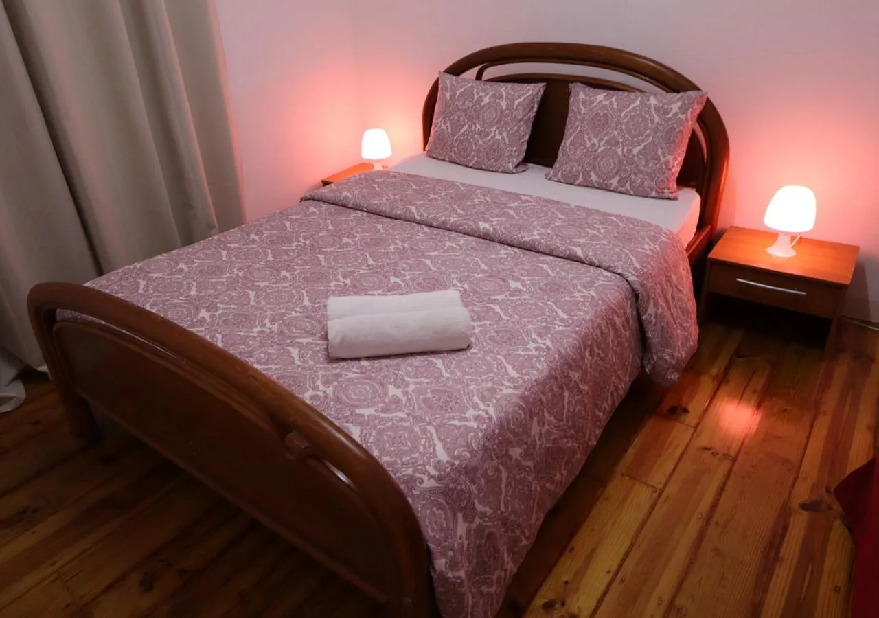 Bed in Welcome Guest House