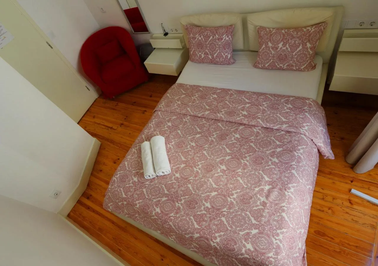 Bed in Welcome Guest House