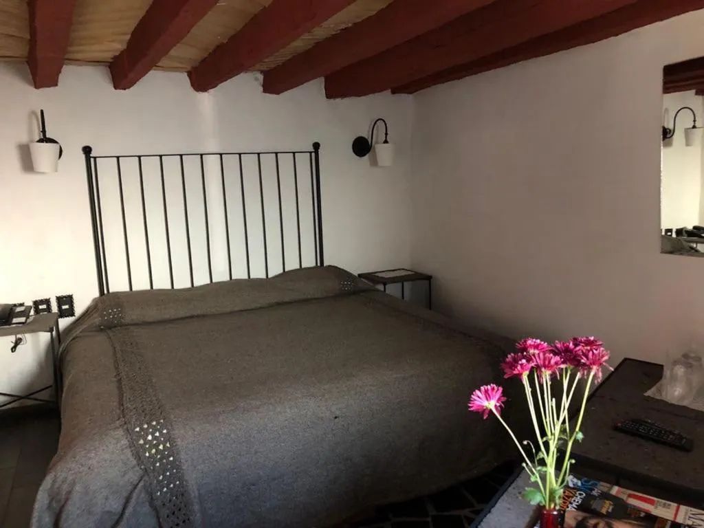 Bed in Hotel Boutique Posada La Basilica