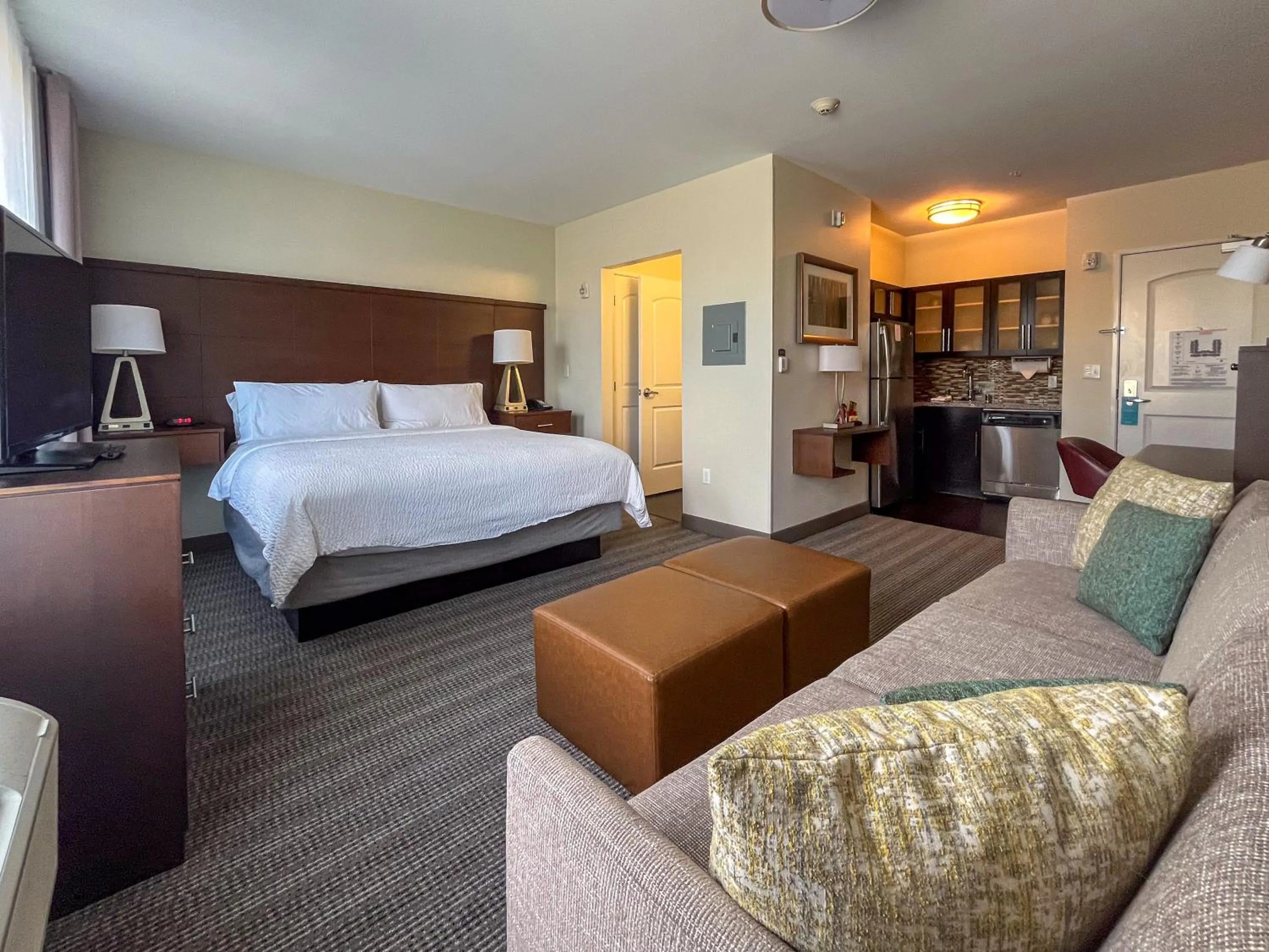 Seating area, Bed in Staybridge Suites Carlsbad/San Diego by IHG