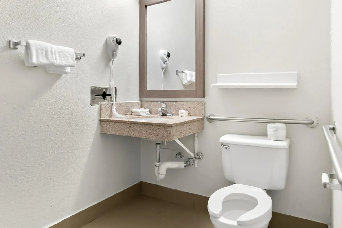 Bathroom in HomeTowne Studios by Red Roof Auburn Hills