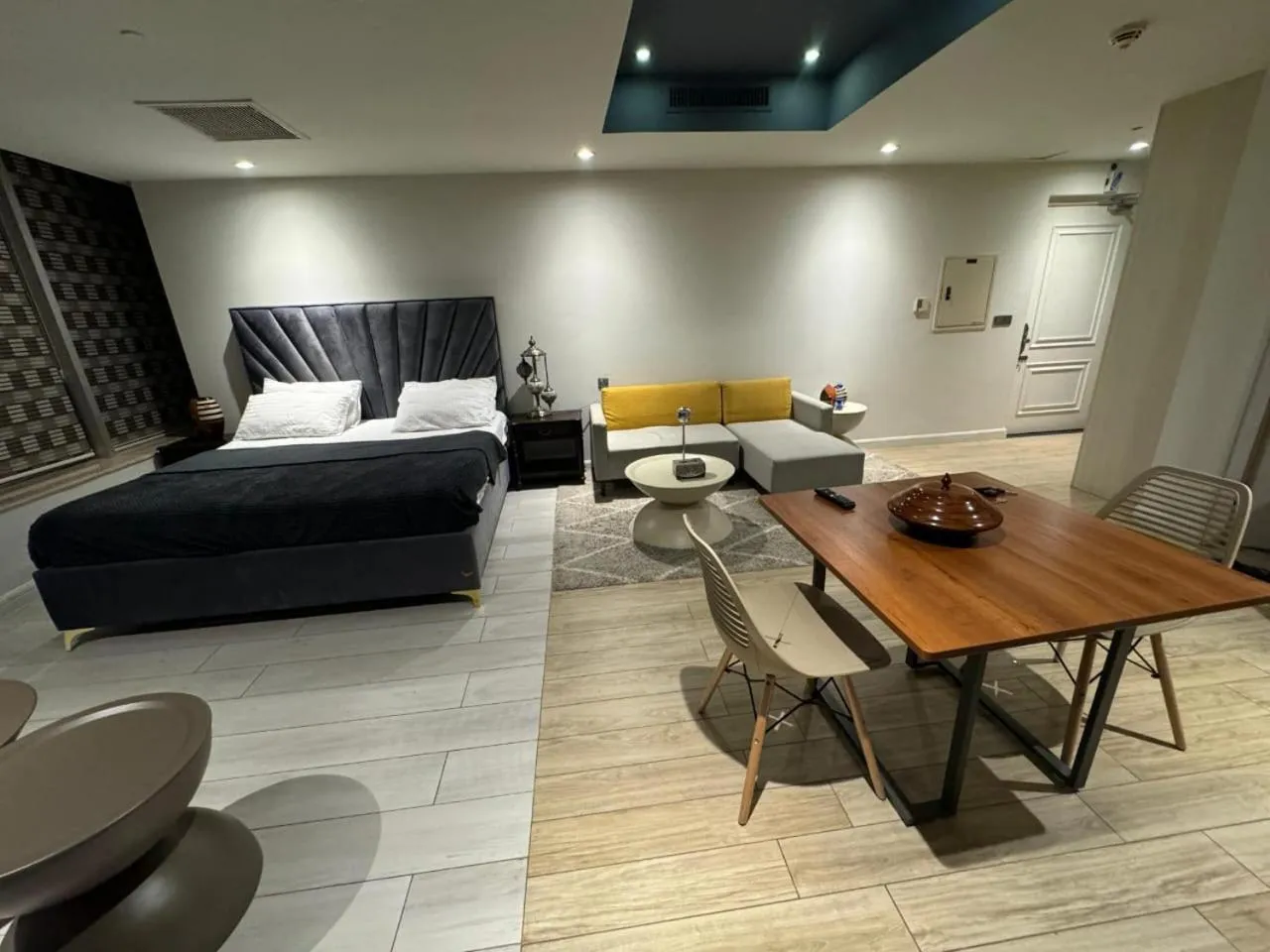 Photo of the whole room, Bed in The Centaurus Apartments