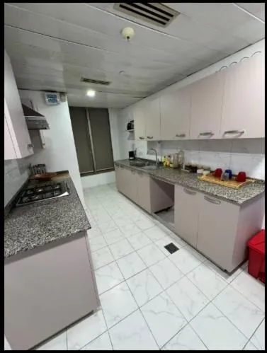 Kitchen or kitchenette in The Centaurus Apartments