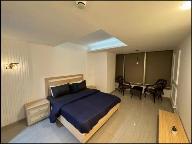 Bed in The Centaurus Apartments