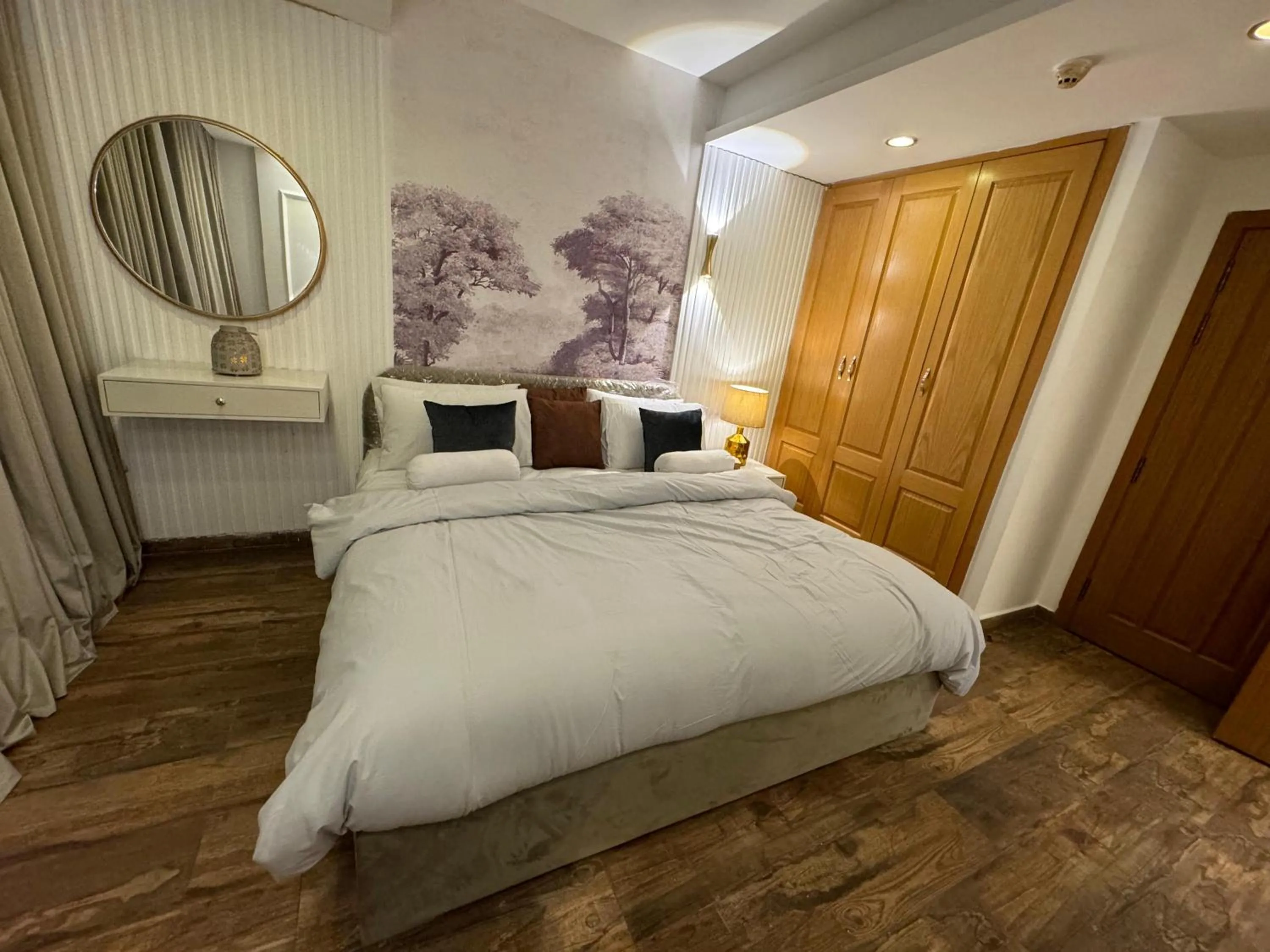 Bed in The Centaurus Apartments