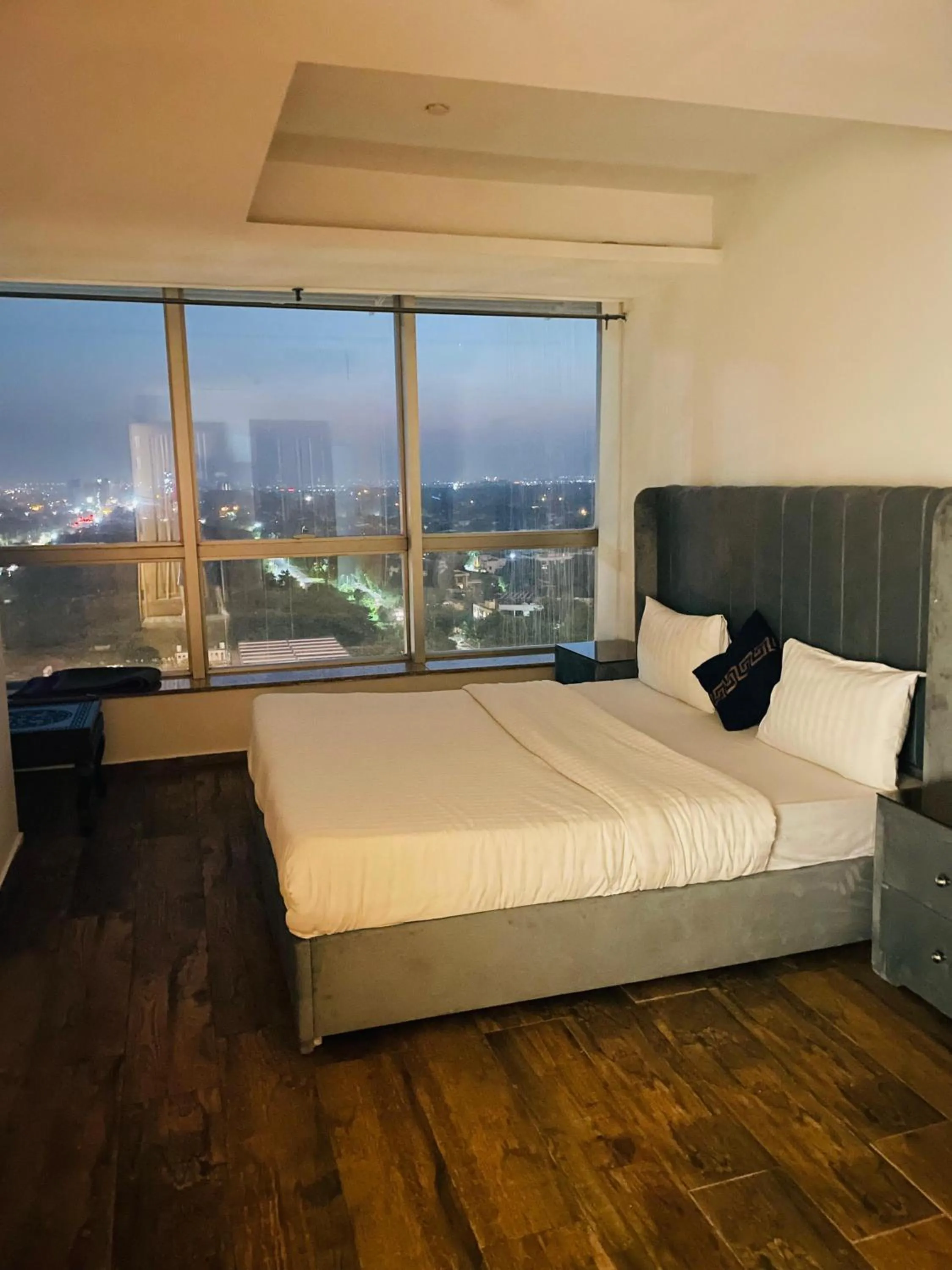 Bed in The Centaurus Apartments