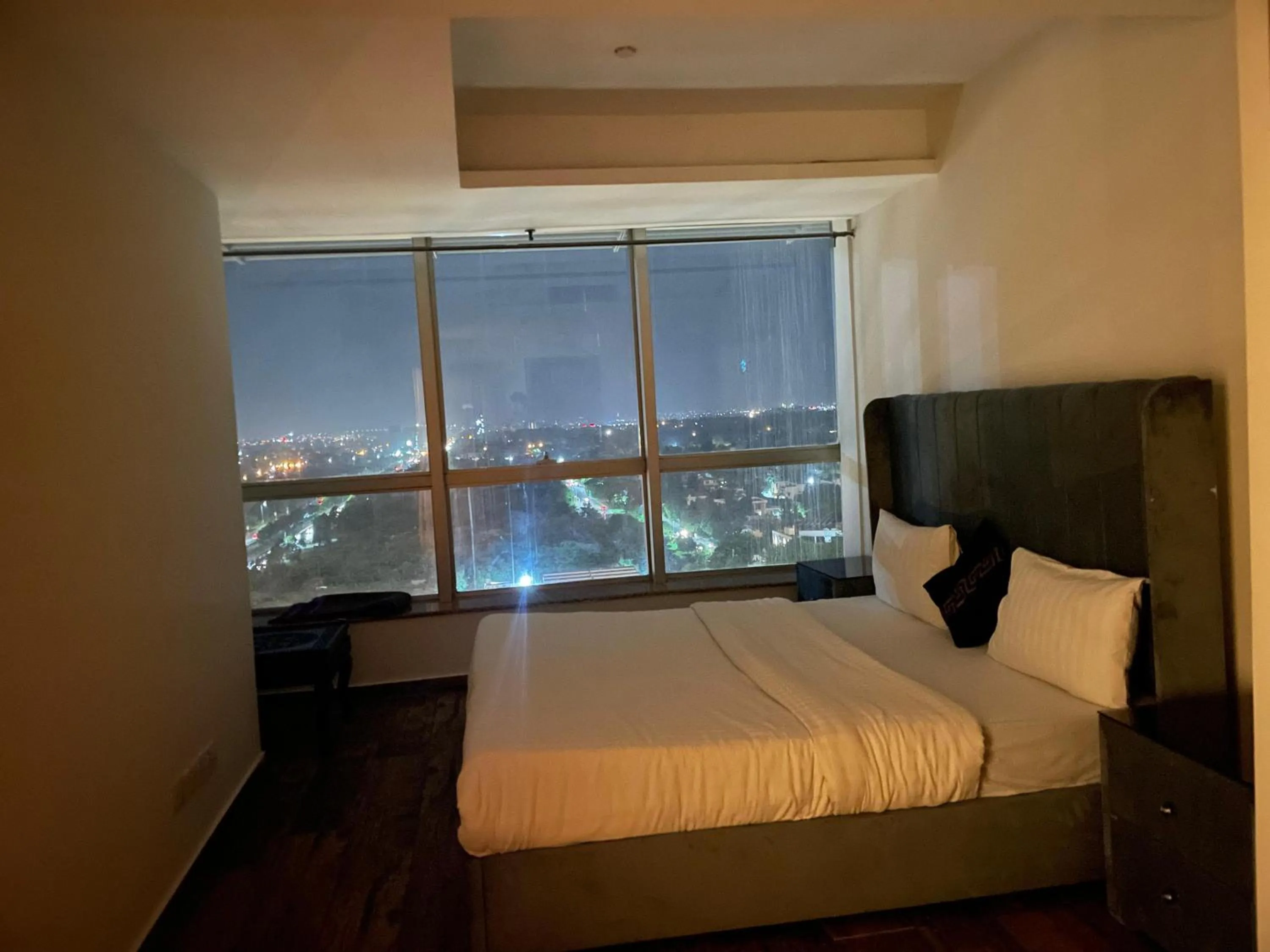 Bed in The Centaurus Apartments