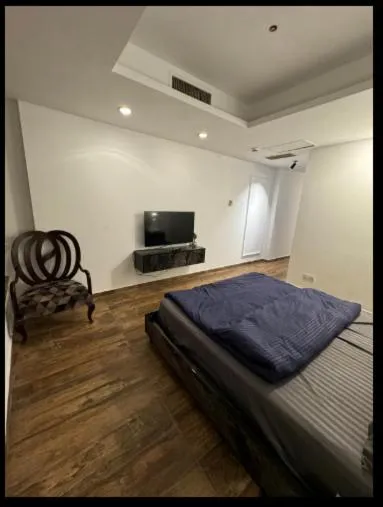 Bed in The Centaurus Apartments