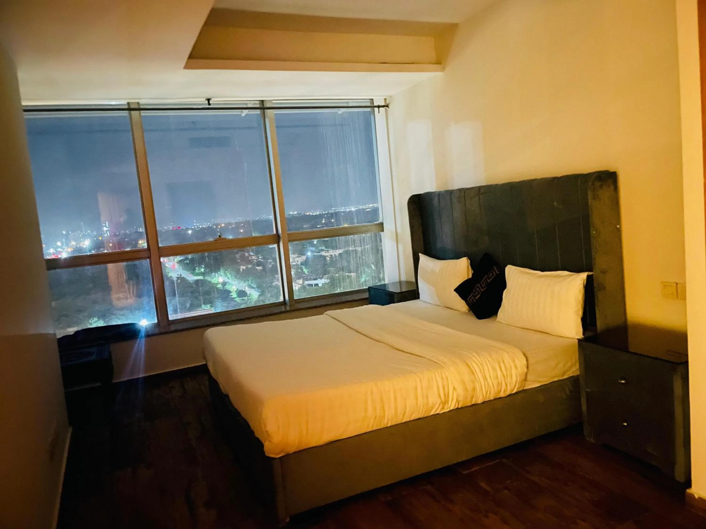Bed in The Centaurus Apartments