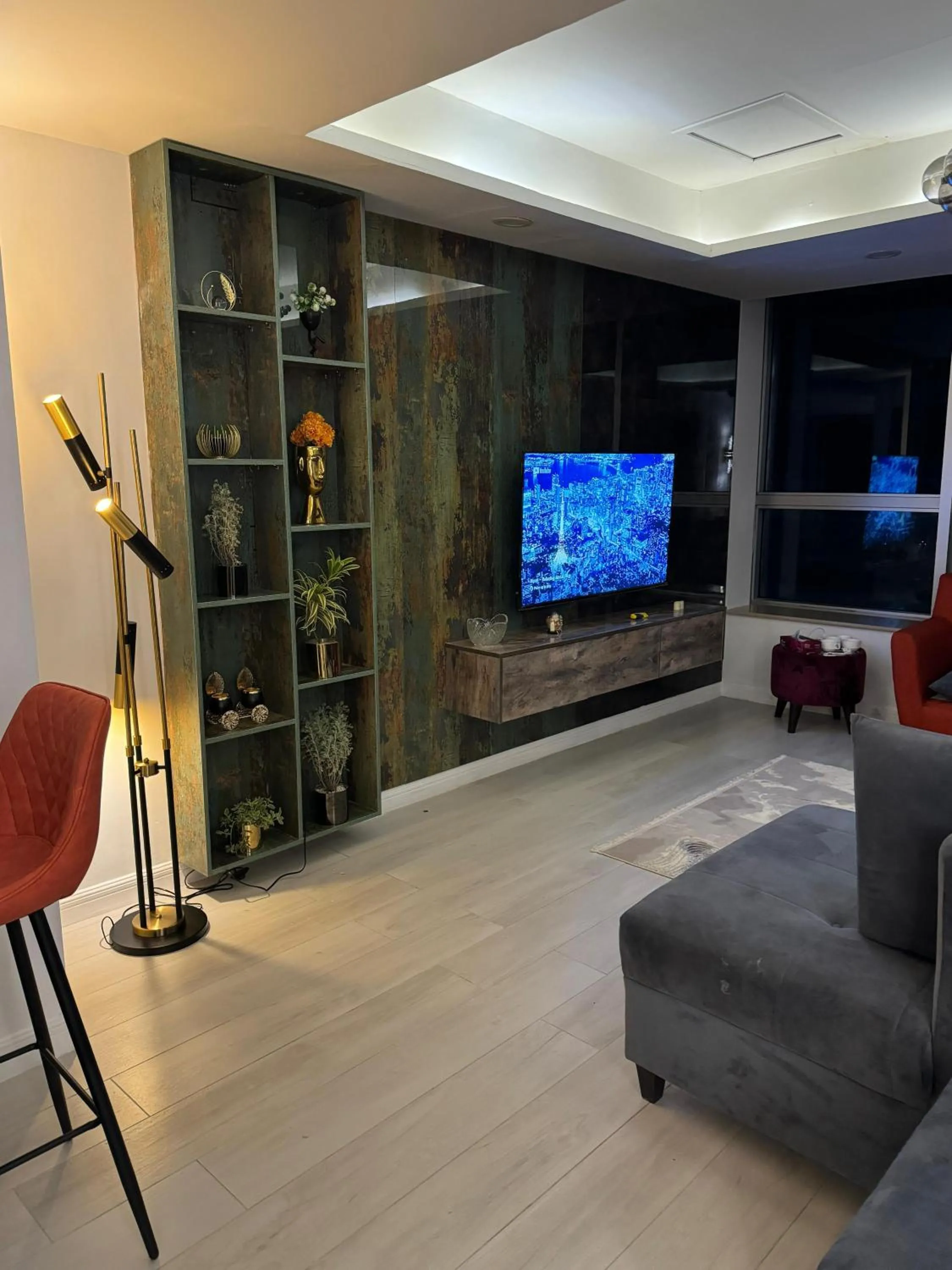 Communal lounge/ TV room in The Centaurus Apartments