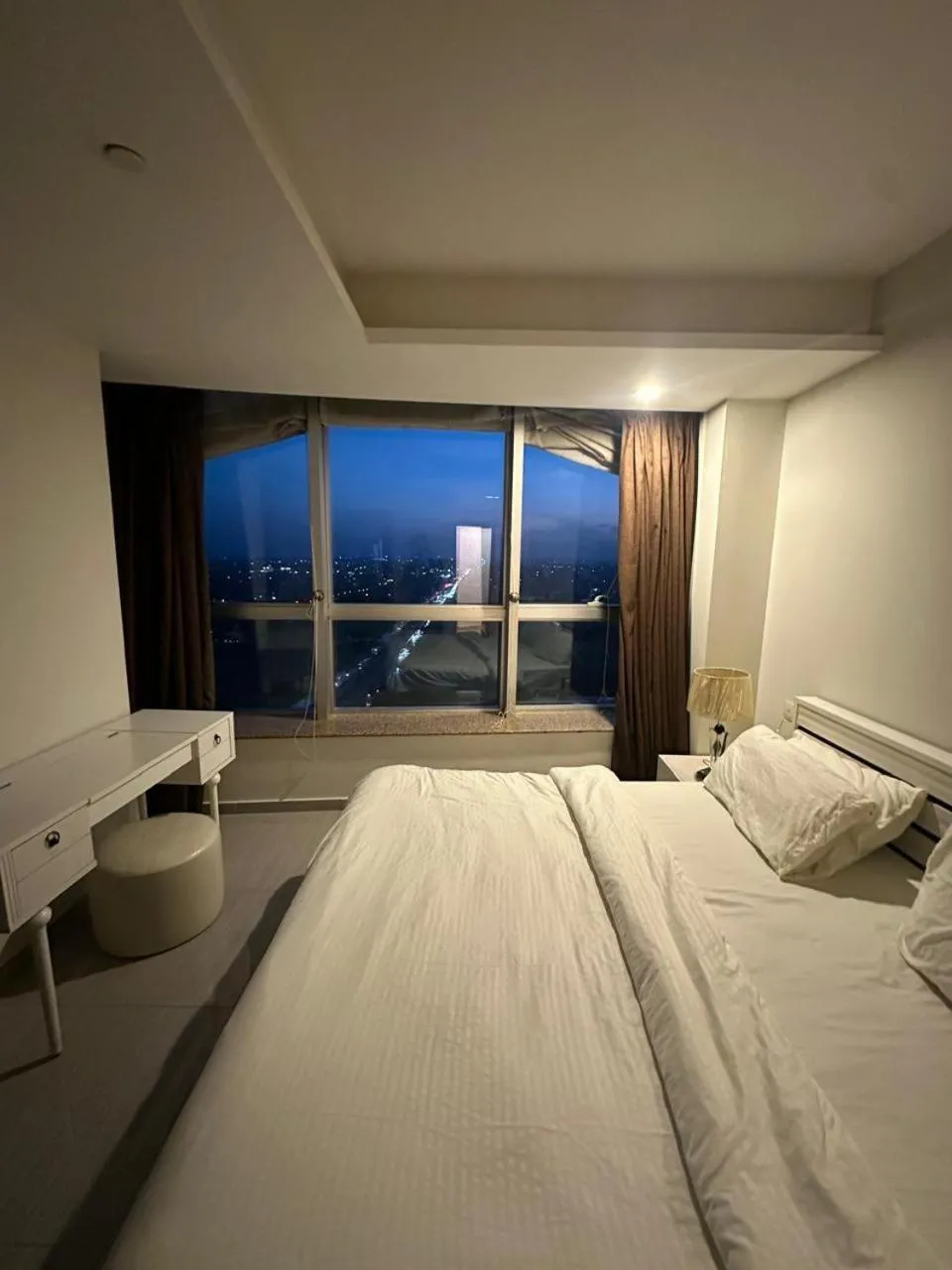 Bed in The Centaurus Apartments