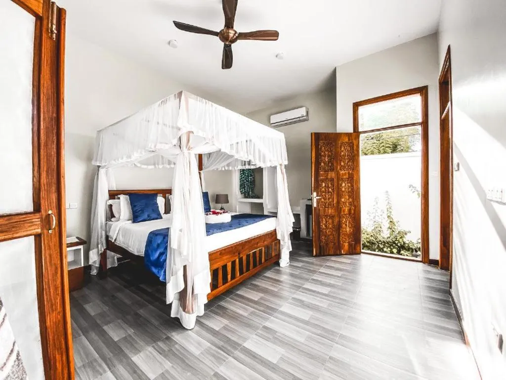 Bed in Indigo Beach Zanzibar