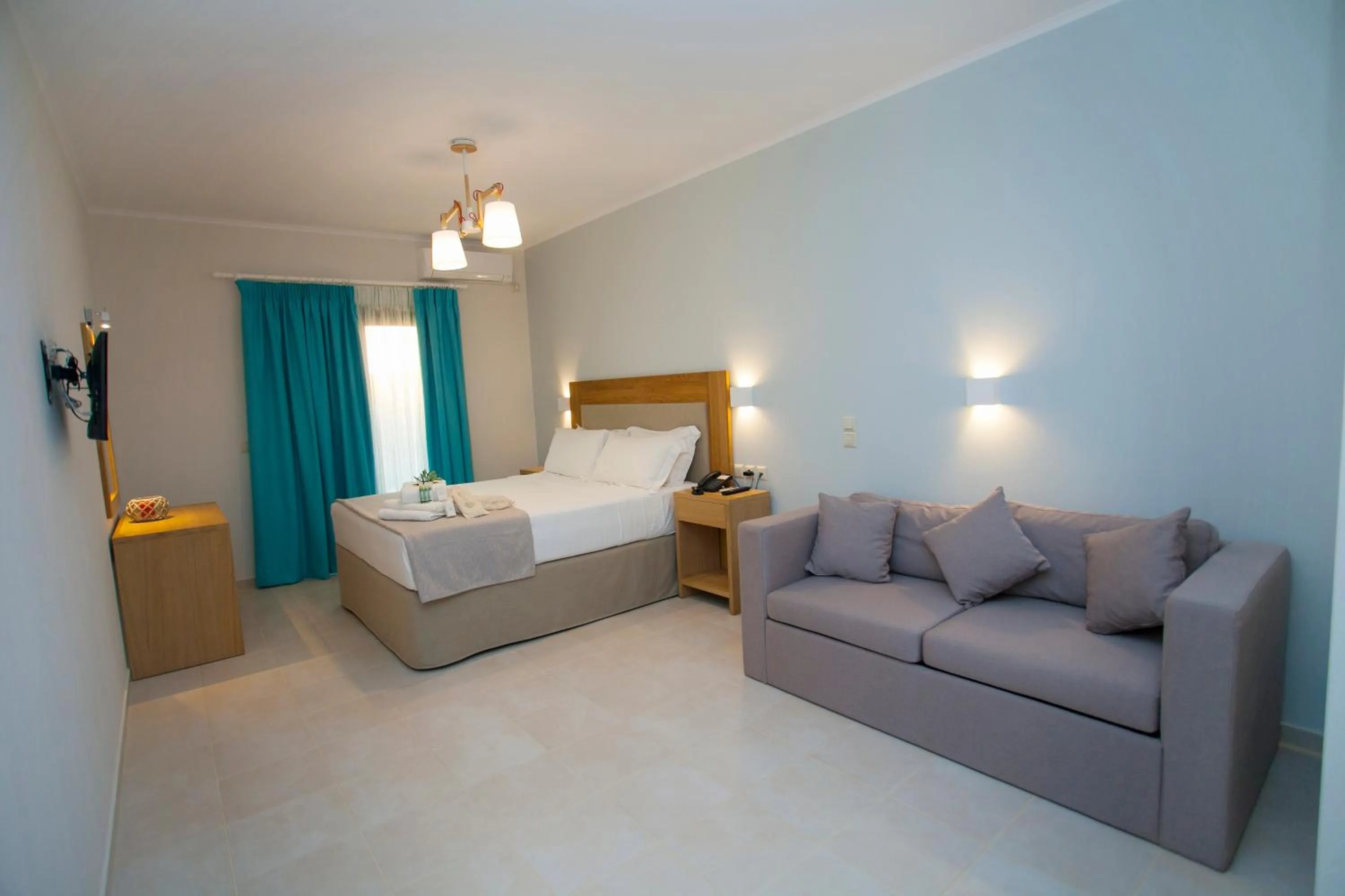 Bed in Aktaia Boutique Hotel