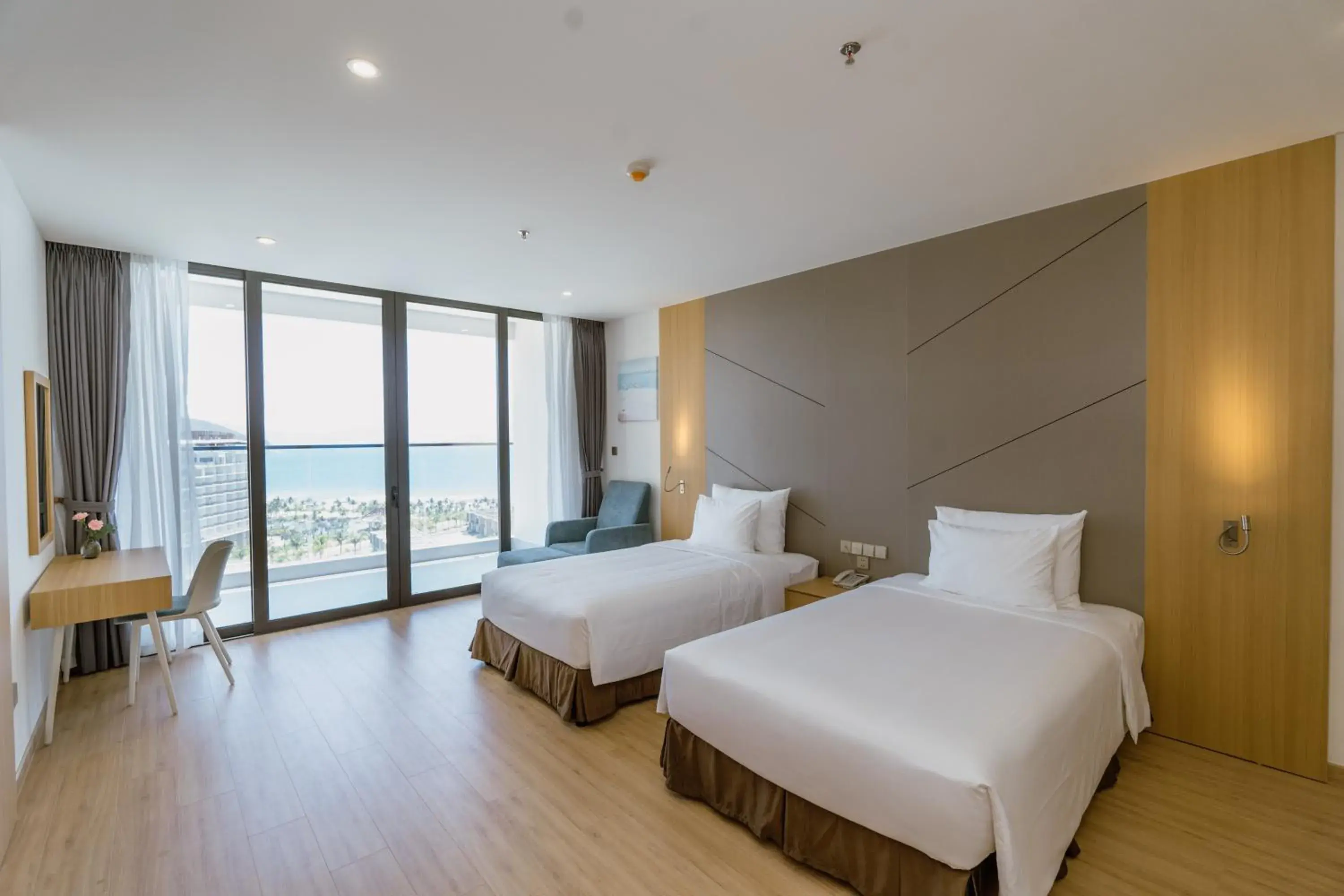 Deluxe Twin Balcony with Ocean view in Aquamarine Cam Ranh - By Swandor Deluxe Twin Balcony with Ocean view in Aquamarine Cam Ranh - By Swandor
