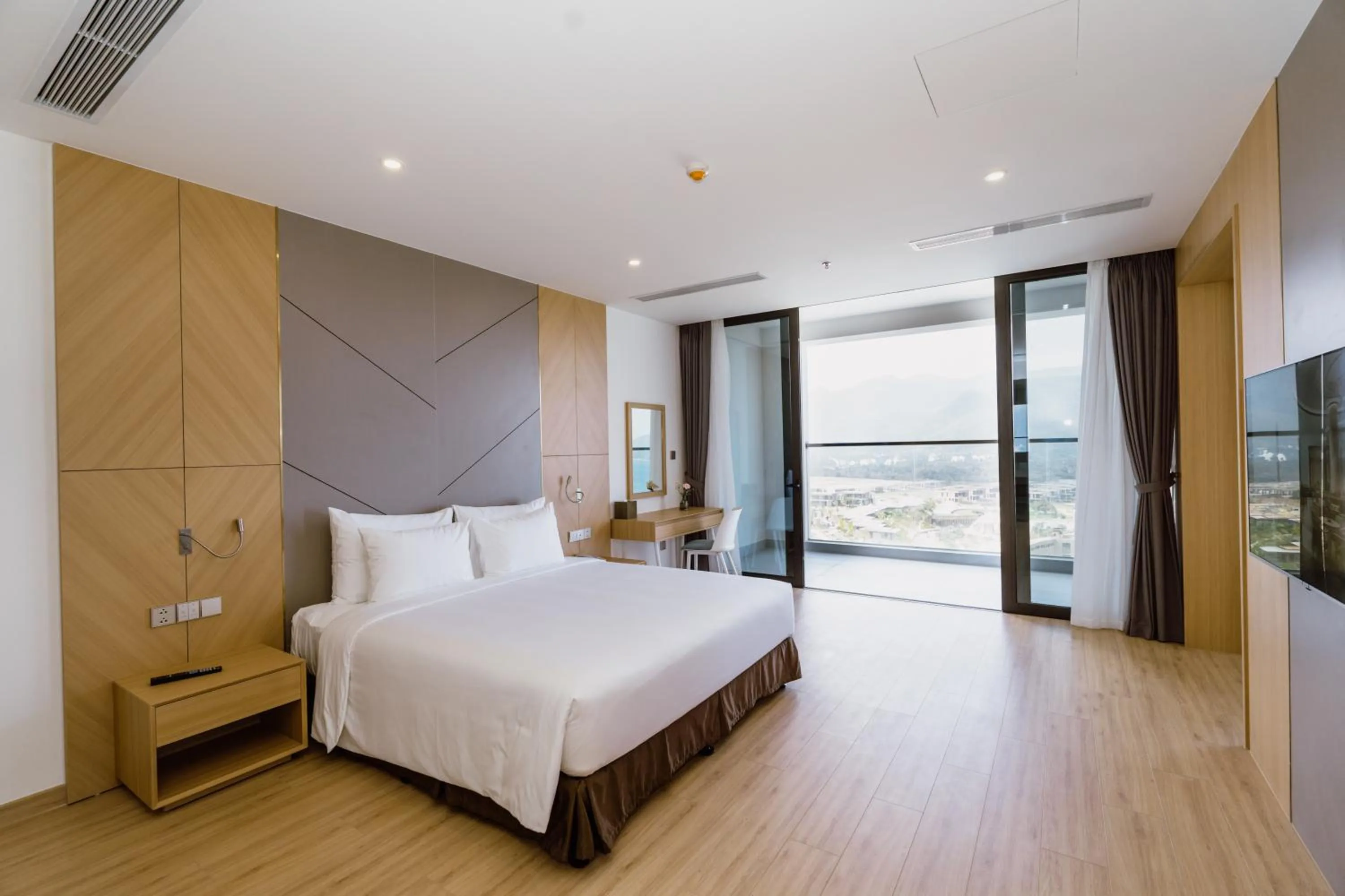 Photo of the whole room, Bed in Aquamarine Cam Ranh - By Swandor