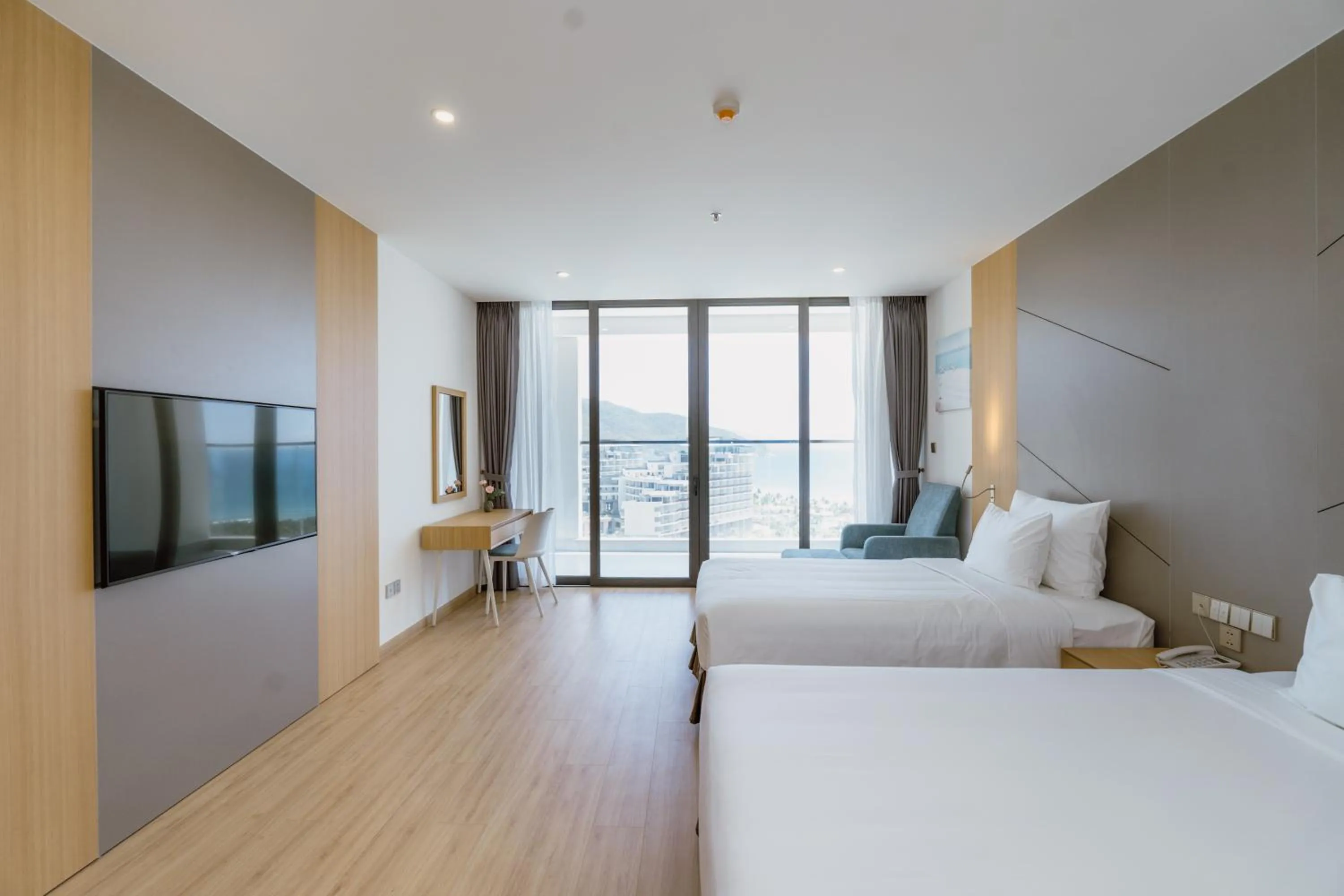 Photo of the whole room, Bed in Aquamarine Cam Ranh - By Swandor