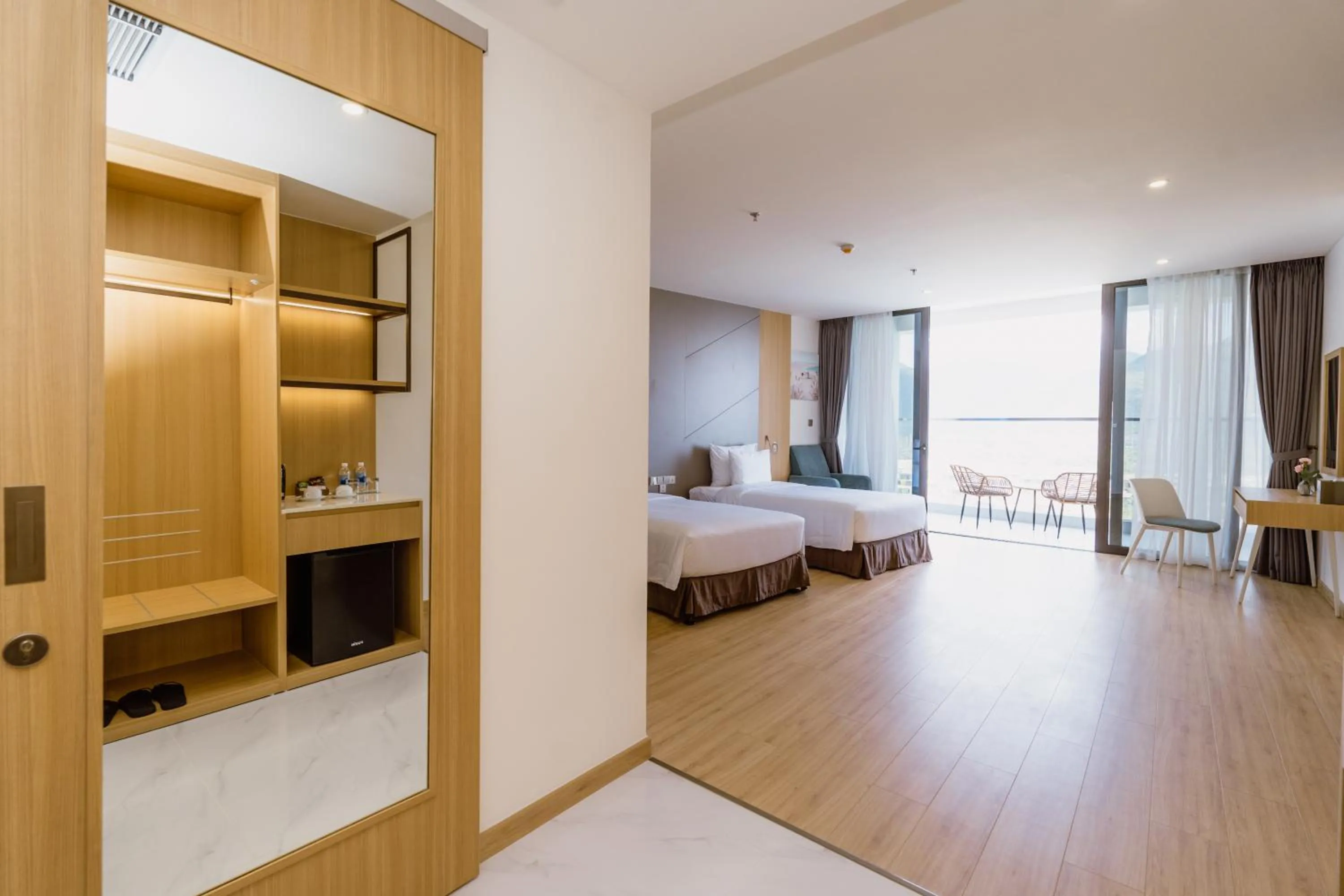 Photo of the whole room, Bed in Aquamarine Cam Ranh - By Swandor