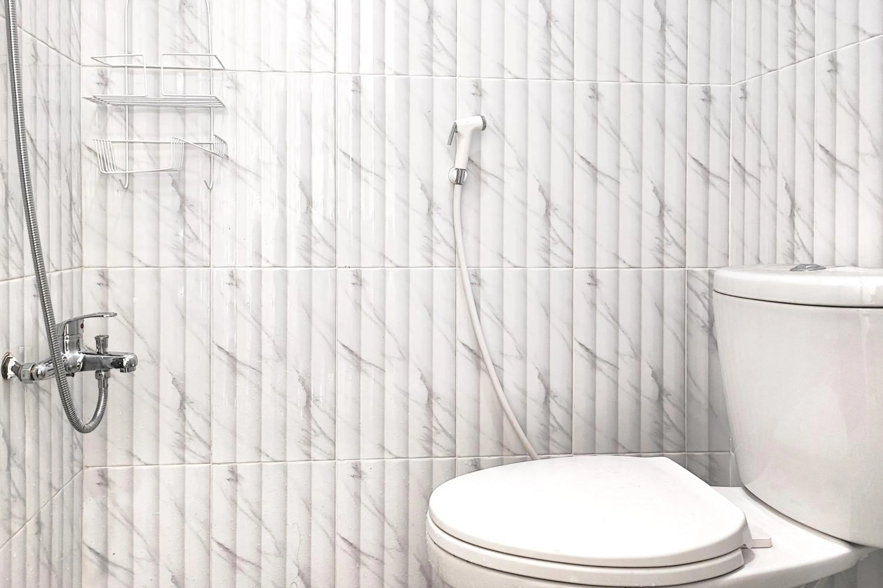 Bathroom in Urbanview Hotel Syariah near Polda Jambi