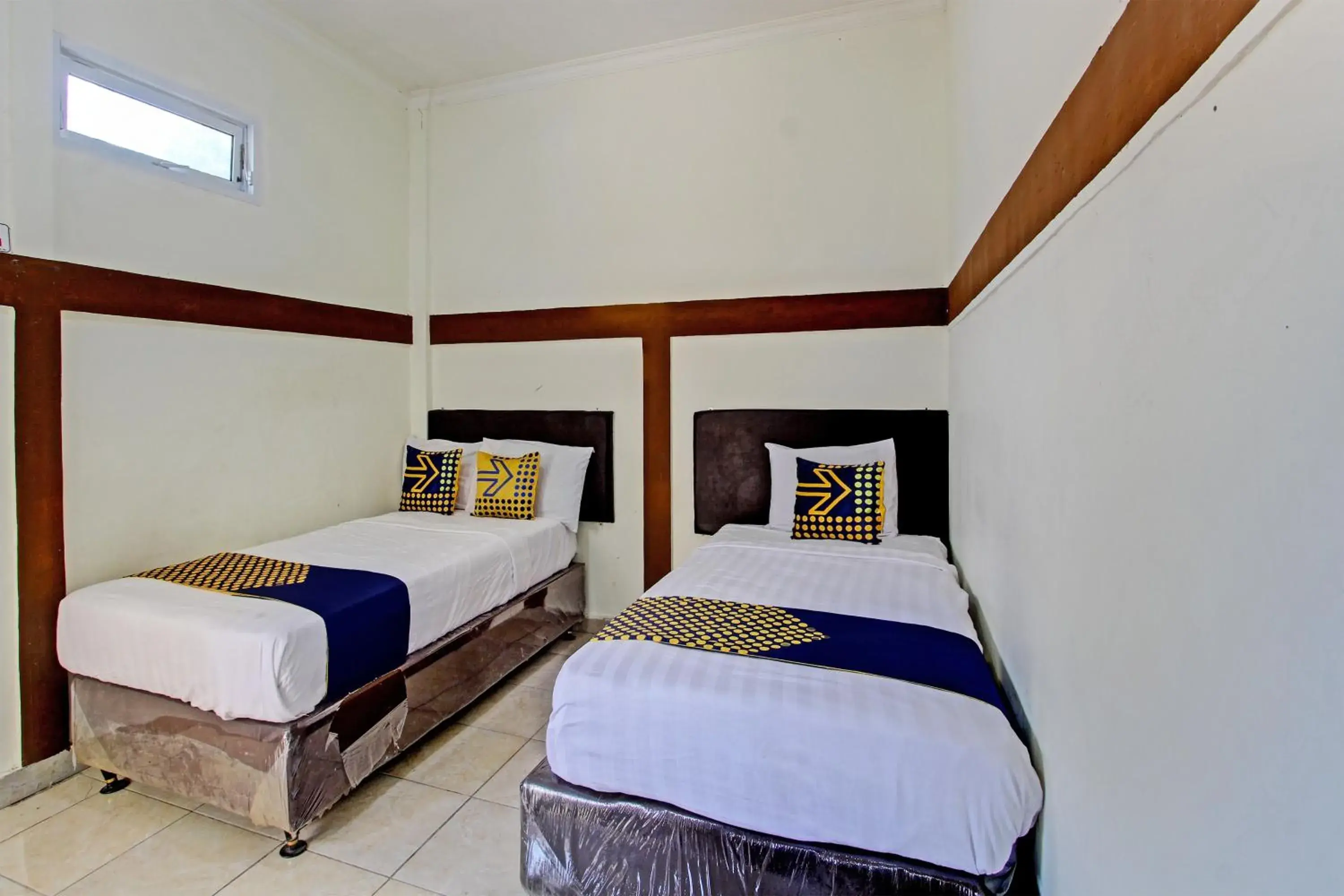 Economy Triple Room in Hotel O Juan Kostel 2 Economy Triple Room in Hotel O Juan Kostel 2