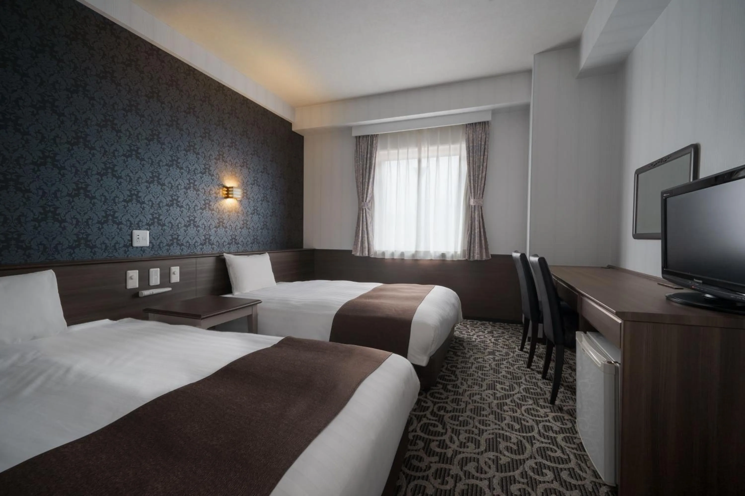 Bed in Hotel Centmain Nagoya