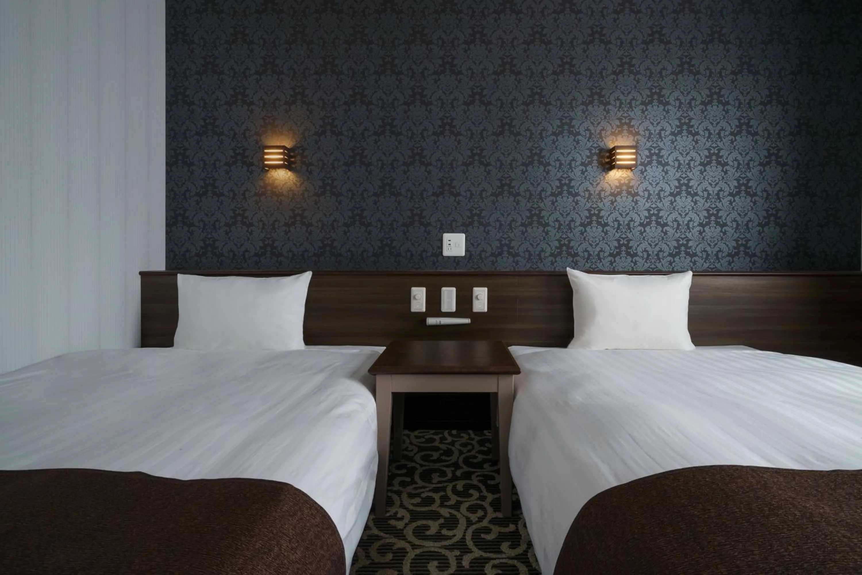 Bed in Hotel Centmain Nagoya