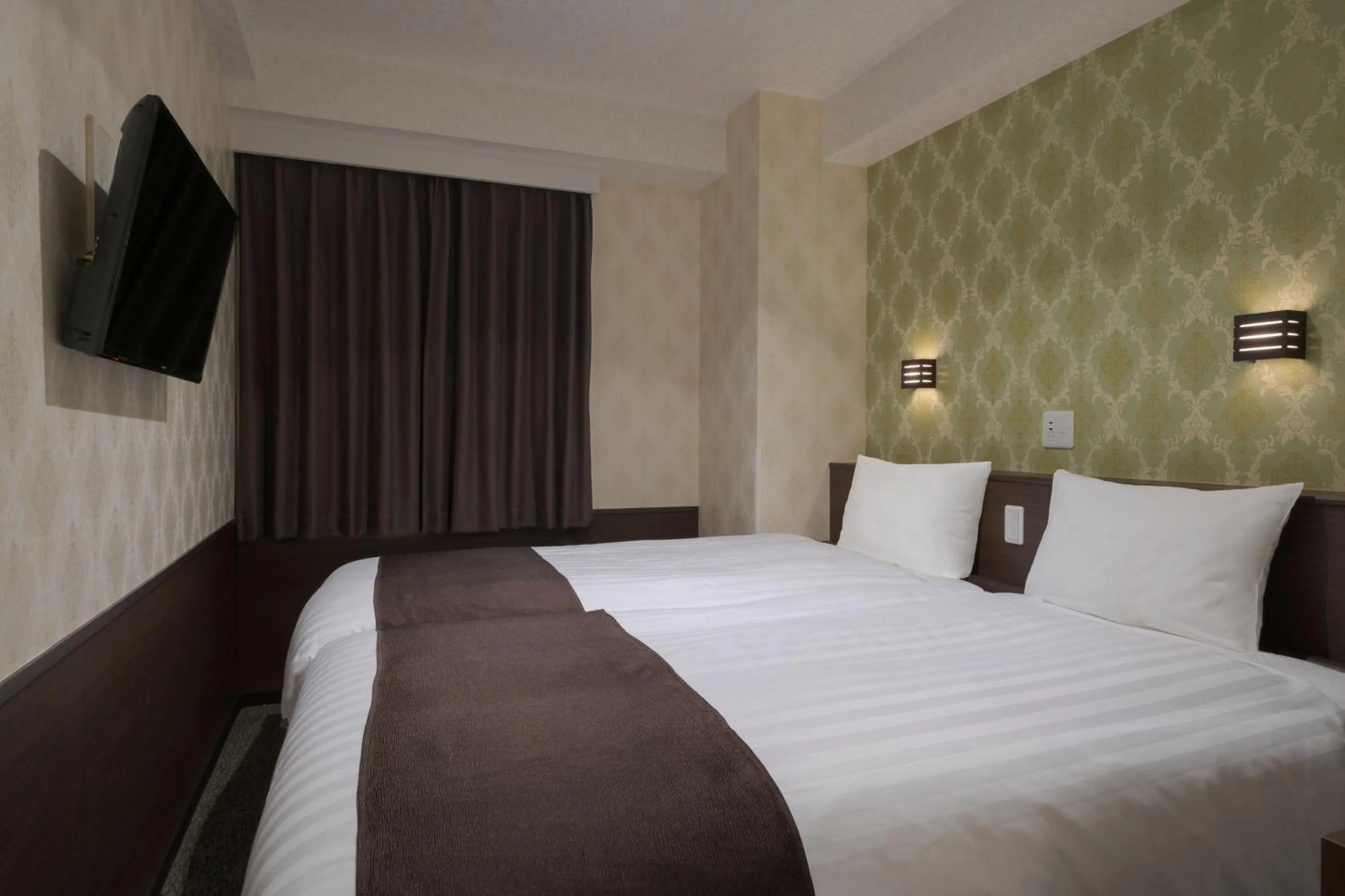 Bed in Hotel Centmain Nagoya